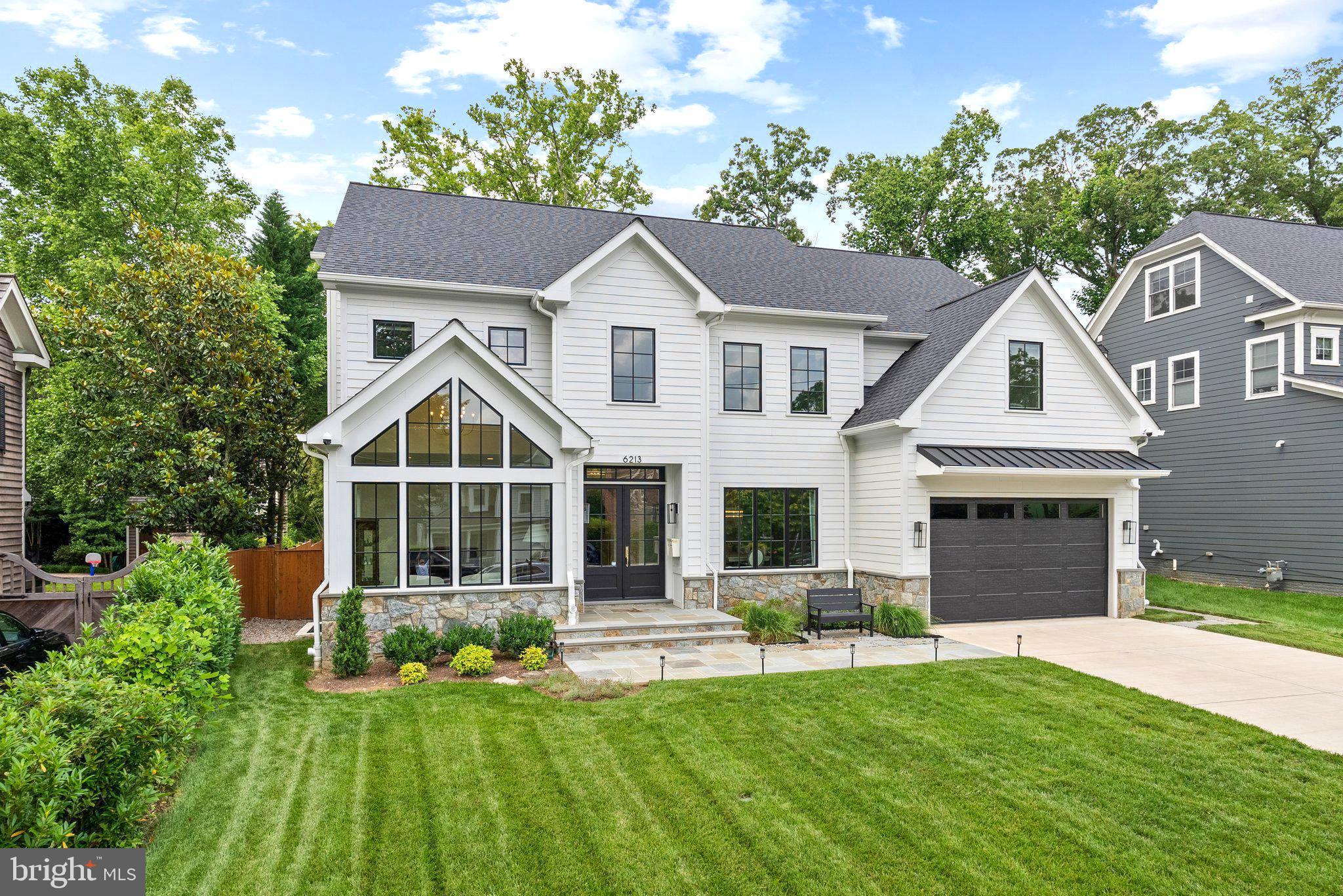6213 Dahlonega Road is a fully realized luxury residence, perfected with care and precision since its 2022 completion. With 8BR, 8.5BA, this custom home blends smart technology with warm, elegant finishes -- the ideal haven for modern living. Elevator, generator, garage, gym, sauna, flat lot, and screened porch with fireplace. Every inch of this Bethesda / Glen Echo Heights showpiece reflects the vision of its owners. Scale, light, and layout distinguish this home from any other new build on the market. Soaring ceilings, custom finishes, and seamless indoor-outdoor flow define the main level, anchored by a main-floor bedroom and generous spaces.  

Thoughtful, functional elegance spans all four levels, connected by elevator (basement to 2nd floor).  At the heart of the home lies a showpiece kitchen featuring custom cabinetry, Jadore quartzite countertops and full-height backsplashes in kitchen and butler’s pantry, 48” Wolf range, built in Wolf microwave, Cove dishwasher, 30” GE Monogram fridge/freezer columns with paneled doors and built-in filtered water, custom range hood millwork, dedicated coffee bar with accent wall paneling, instant hot water dispenser, and walk-in pantry with built-ins and secondary fridge/freezer for seamless prep and storage.  

Additional features include three-zone central HVAC, Generac 22kW full-home generator, 25 Cat6a ethernet runs throughout the home including 5 exterior for PoE cameras & doorbell, W/D in both the main laundry and mudroom for flexibility, two 14-50 NEMA outlets in garage for simultaneous level 2 EV charging, and 16 ceiling speakers throughout the home for relaxation and unforgettable entertainment. 

Craftsmanship shines in every space with custom millwork throughout,  designer light fixtures, Brizo plumbing fixtures, custom stair rails with tailored stair runner, and custom closets in all bedrooms.  The primary suite is a serene, spa-like retreat with custom wall paneling, oversized walk-in closets with built-ins, luxurious bath with steam shower and premium finishes.  Step outside to a screened porch that makes every season shine, equipped with two Infratech ceiling heaters, ceiling fan, gas fireplace, and  hardwired ethernet for streaming and entertainment. The expansive lower level balances indulgence and practicality with a wet bar with sink and dishwasher, full-size sauna, home gym with custom wood-trimmed mirrors and specialized flooring, and extra-large utility and storage room. 

Perfectly situated along the Mass Ave corridor, enjoy unmatched access to D. C. , Bethesda, and Northern Virginia. Set on a peaceful residential street, just minutes to downtown Bethesda, the location offers quick access to DC, Bethesda, and Northern VA as well as close proximity to parks, Capital Crescent Trail, retail, and dining. Zoned for Wood Acres Elementary, Pyle Middle, and Whitman High. 

Glen Echo Heights: A friendly, close-knit community known for its undulating terrain, mature tree-top canopies, and walking trails to the beauty Potomac River, as well as, the arts and culture of Glen Echo Park. Conveniently located near downtown Bethesda, Friendship Heights, NW D. C. and major commuting routes, Glen Echo Heights is a supreme location close to everything while providing a secluded retreat for its residents. There is also the Glen Echo Heights Neighborhood Park featuring a playground, basketball court, and a multi-use field. 

Unlike many new builds, this property isn’t subject to supply chain delays or price volatility. It’s finished, move-in-ready, and fully dialed in. Buyers can feel confident every system, finish, and function has been tested and refined.  A rare combination of new construction, timeless design, and move-in-ready perfection, 6213 Dahlonega Road is a refined estate built to evolve with your lifestyle, with every inch reflecting thoughtful, modern living.