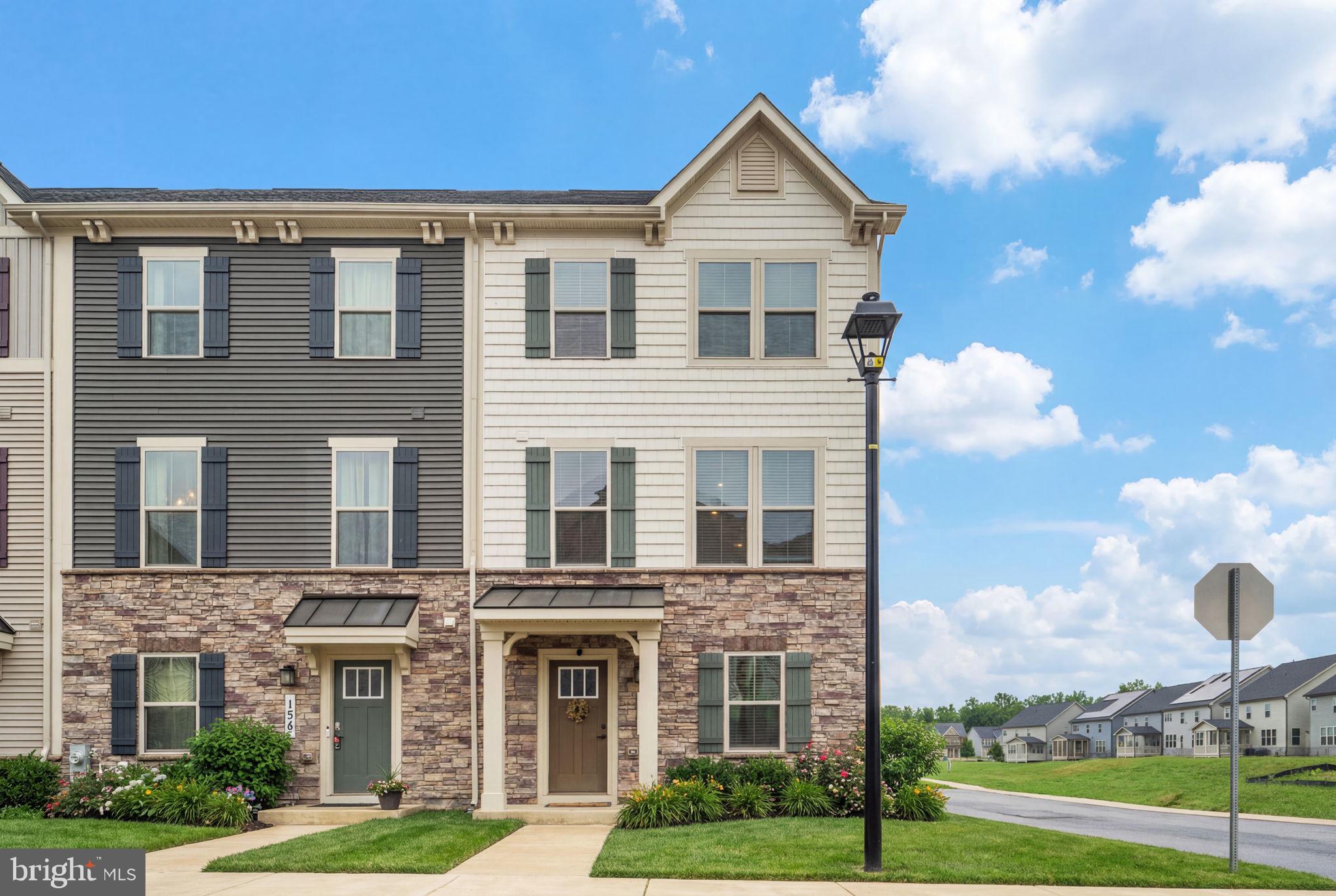 Welcome to this beautifully cared-for end-unit townhome in the highly desirable Patuxent Greens community, where space, style, and comfort come together effortlessly.

From the moment you step inside, you’ll feel right at home. The open, airy layout is filled with natural light, creating a warm and inviting space perfect for both relaxing and entertaining. The oversized kitchen is truly the heart of the home, making it ideal for gathering with friends, hosting, or simply enjoying everyday moments.

Upstairs, the primary suite offers a peaceful retreat, complete with a tray ceiling and plenty of room to unwind. Two additional bedrooms provide flexibility for guests, a home office, or whatever your lifestyle needs.

As an end-unit, you’ll enjoy extra privacy and sunlight, along with a rear-entry two-car garage that keeps the front of the home looking clean and welcoming. Step out onto your private balcony for a quiet moment to start or end your day.

All of this in a vibrant, growing community with easy access to major commuter routes, shopping, and dining.

This isn’t just a house, it’s a place to settle in, make memories, and truly feel at home. Come see it for yourself!