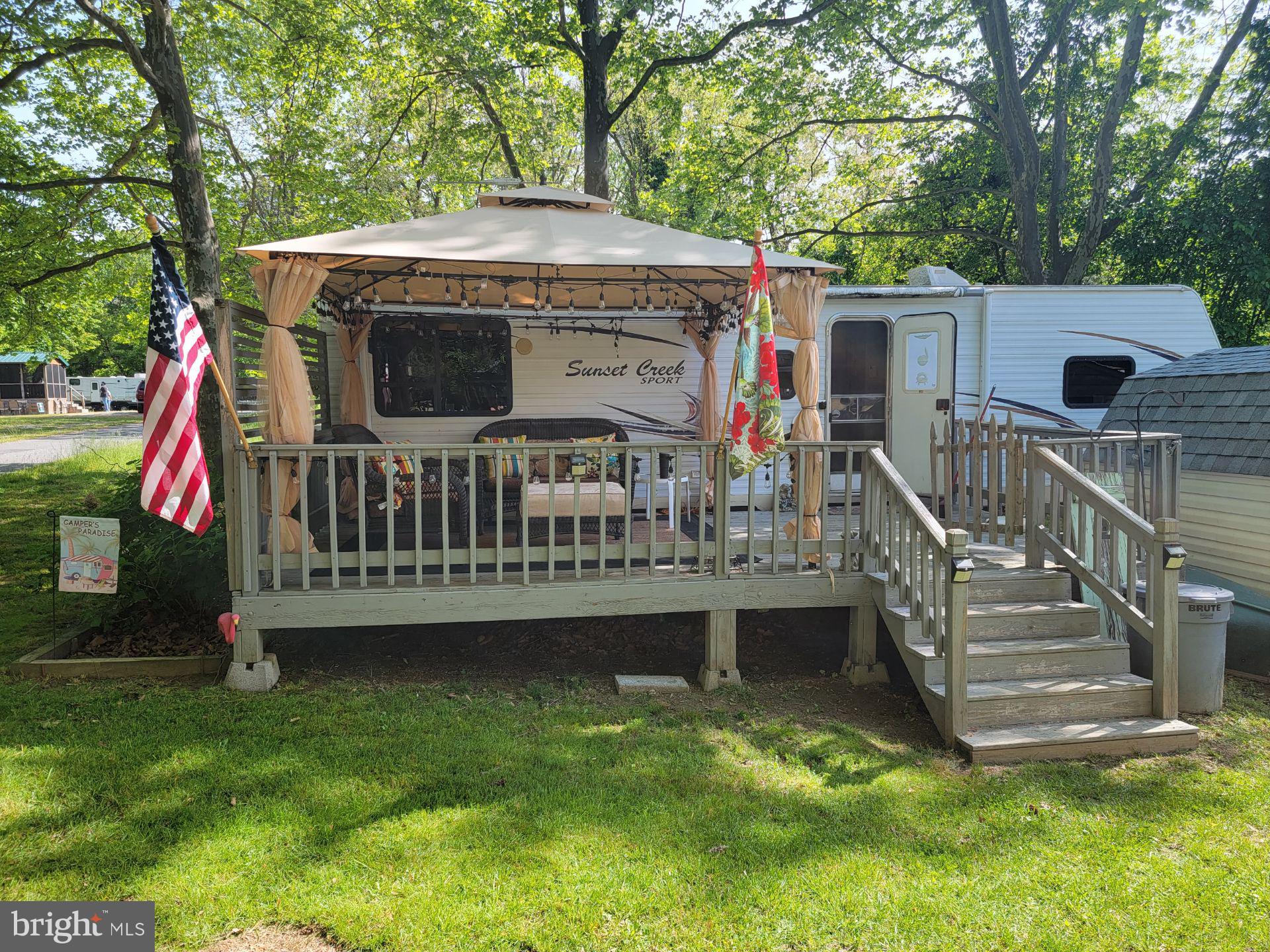 One lot located in Indian Acres Campground. 2013 Winnebago Sport Creek with 1 bedroom, 1 bath, 10x20 deck to enjoy on those summer evenings with the party lights on. Included in the purchase is an  8x10 shed A Per Cecil County you are only permitted to stay 150 days a year no more than 100 consecutive days. Pool open Memorial day through Labor day with lifeguards on duty. Boat ramp open year round as is the campground and convenience stations. Come check it out. I'm happy to show you every feature of this happy place community.