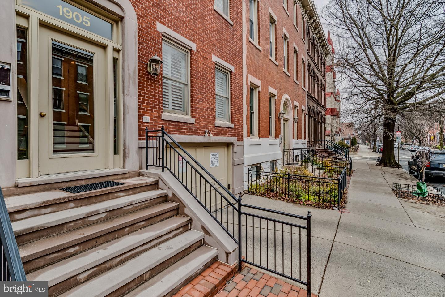 Step into an effortless city living experience with this rare first floor sunny condo, stylish and designed for comfort. With north and south facing windows, the home is filled with natural light that highlights the hardwood floors, crown molding and inviting color palette.

This two-bedroom, two-bathroom condominium in an elegant boutique building along picturesque Green Street, including on premises secured deeded parking.

The open floor plan flows into a spacious living and dining area, making it easy to entertain or unwind.  Newer Stainless-steel appliances, double sink, granite countertops and generous cabinetry make the kitchen a joy for someone who likes to cook.

The primary suite is like a private sanctuary, complete with a beautifully organized walk-in closet and an en-suite bathroom. Step onto your private terrace for a quiet moment to relax and unwind.

The second bedroom -currently used as a home office- features custom built-ins with shelving and storage.

Additional highlights include a second full bathroom, plantation shutters, private HVAC, newer in-unit GE washer/dryer, sizable pantry/storage with sliding shelves and a separate dedicated storage unit.

This warm and vibrant neighborhood offers unmatched walkability to the Barnes, Rodin, the new
Calder and Philadelphia Museum of Art, Whole Foods, Target and is filled with charming cafes,
restaurants and shops.