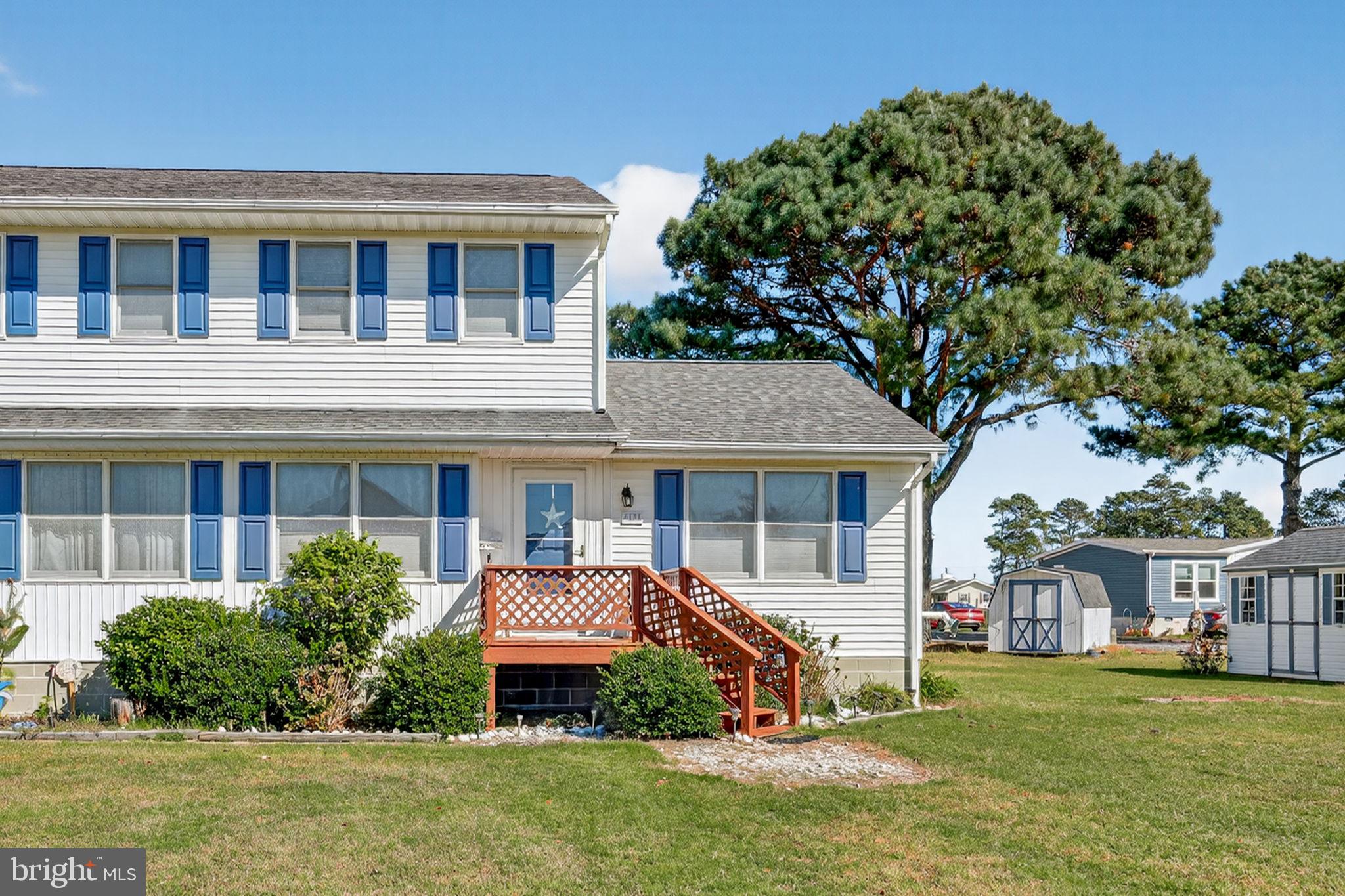 Back on the market—no fault of the seller! Previous buyers were unable to move forward due to their home sale not closing, giving you a second chance at this beautiful property.

Escape to tranquility on Chincoteague Island in this charming and well-maintained 2-bedroom plus office, 1.5-bath duplex, ideally situated on a quiet dead-end street. From the moment you arrive, the inviting front porch welcomes you to relax and enjoy the peaceful island setting. Inside, the spacious living room impresses with soaring cathedral ceilings and stylish luxury vinyl plank flooring, creating a bright, open atmosphere. Just beyond, the sun-filled sunroom offers a versatile space perfect for relaxing, working from home, or pursuing hobbies.

The eat-in kitchen provides ample room for dining and everyday living, while the main level also features a comfortable bedroom, convenient laundry area, and a well-kept half bath. Upstairs, you’ll find two additional inviting bedrooms and a full bath, offering privacy and flexibility for guests or family.

Outdoor spaces are just as appealing, with two storage sheds for all your beach gear and hobbies, along with a charming gazebo that creates the perfect setting for entertaining or unwinding outdoors. The home also features a newly installed septic system, offering added value and peace of mind. Being sold turnkey and fully furnished, this home is ready for immediate enjoyment.

Whether you’re looking for a full-time residence, vacation getaway, or investment opportunity, this property offers the best of coastal living just minutes from beaches, dining, and all that Chincoteague Island has to offer.