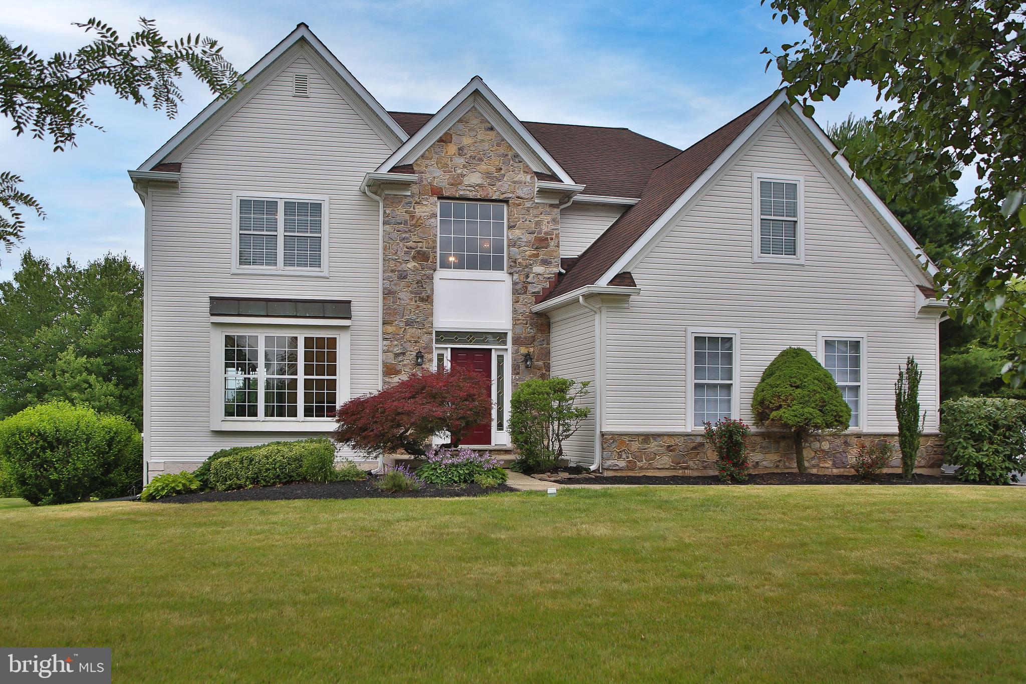 Welcome home to this beautifully updated and meticulously maintained 3,000+ square foot residence, perfectly situated on a picturesque half-acre lot overlooking peaceful wooded open space. Offering 4-5 bedrooms, 3½ baths, and three finished levels of thoughtfully designed living space, this home is ideal for both everyday living and entertaining.
Step inside the impressive two-story foyer, where you're welcomed into bright, open living spaces featuring new carpeting and updated flooring. The spacious living room flows seamlessly into the heart of the home—a stunning island kitchen complete with granite countertops, abundant cabinetry, and a sliding glass door leading to the expansive rear deck with retractable awning. Whether you're enjoying your morning coffee or unwinding after a long day, the private wooded backdrop creates the perfect setting.
Conveniently located on the main level, the laundry room offers direct access to the outside, making everyday tasks like gardening, yard work, or bringing in pets simple and convenient.
Up the turned staircase, the spacious primary suite offers a peaceful retreat with a separate sitting room or home office, a generous walk-in closet, and an ensuite bath featuring a soaking tub, separate shower, and double vanity. Three additional generously sized bedrooms and a full hall bath complete the second floor.
The finished walk-out lower level provides endless possibilities with an expansive recreation and gathering area, complete with a wet bar, mini refrigerator, and cozy gas stove for those cooler evenings. Sliding glass doors fill the space with natural light and provide easy access to the backyard. This level also features a fifth bedroom or flexible space for a home office, gym, or den, along with a full bath. A separate storage area neatly houses the home's utilities.
Conveniently located just minutes from the Pennsylvania Turnpike, shopping, parks, walking and biking trails, and some of the area's favorite dining destinations, including Butcher & Barkeep, Bella Fiona, Lederach Corner Store Piano Bar, Bay Pony, The Vault, and many more. Quaint Skippack Village, with its charming boutiques, restaurants, and seasonal events, is only a five-minute drive away.
Lovingly cared for by its original owners, this exceptional home is ready for its next chapter. A one-year home warranty is included for added peace of mind.