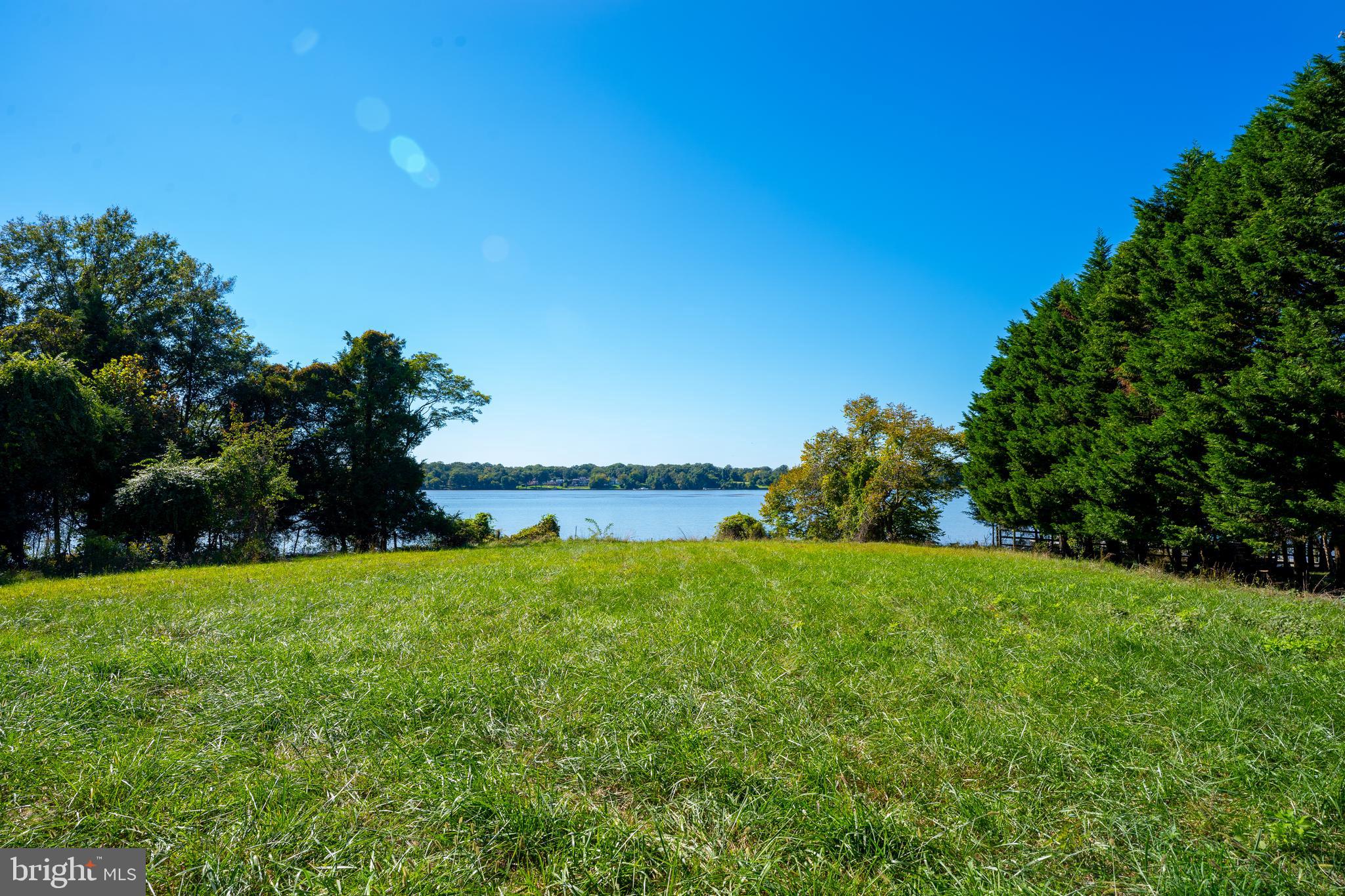 WATERFRONT HOME SITE. Build your custom dream home on over 6.5 acres of land along the Potomac River.  Enjoy the perfect combination of accessibility and seclusion, with potential for a tree-lined,  private driveway opening up to this beautiful lot.  An array of trees naturally flow into a picturesque field footsteps from the water.  Prior plans were created to accommodate a 10,000 square foot home with plenty of outdoor and recreation space remaining.  Build your home, outdoor pool, guest house, and any other amenity you've dreamed of.  This is a rare opportunity to own this completely customizable waterfront property right along the Potomac, centrally located minutes away from the National Harbor, Old Town Alexandria, and Washington D.C. Taxes reflect an agricultural deferment.