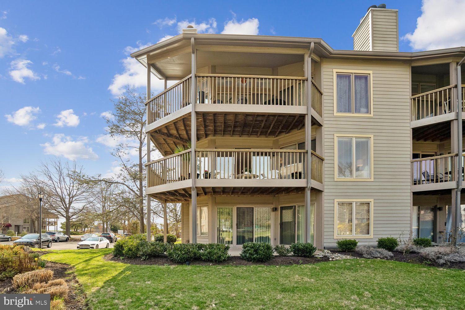 Welcome to this beautiful 2 bedroom 2 bath coveted end unit condo in the sought-after gated Chesapeake Harbour community, This home is a rare find, offering the perfect blend of privacy, natural light, and outdoor space. Inside, the additional square footage an end unit offers  creates an open floor plan bathed in sunlight, thanks to windows on three sides. The living spaces are airy and inviting, with seamless flow from the cozy living room to the dining area and updated kitchen. You'll love the thoughtful details, including hardwood floors, a fireplace for those cooler evenings, and scenic views that bring the outdoors in. This home is ideally located to enjoy watching the sunrise over Chase Pond and the Bay with your morning coffee or tea. Later in the day the oversized wrap-around deck invites you to relax, entertain, or simply soak in the tranquil surroundings and watch the sunset over the Marina. Chesapeake Harbour is a vibrant, amenity-rich community with access to 2 pools, 2 tennis and pickle ball courts, kayaking, walking trails and a marina, all just minutes from downtown Annapolis. Whether you're a boating enthusiast or simply crave the coastal lifestyle, this property checks all the boxes. Don’t miss your chance to own this one-of-a-kind retreat. Schedule your tour today and experience Chesapeake Harbour living at its finest!