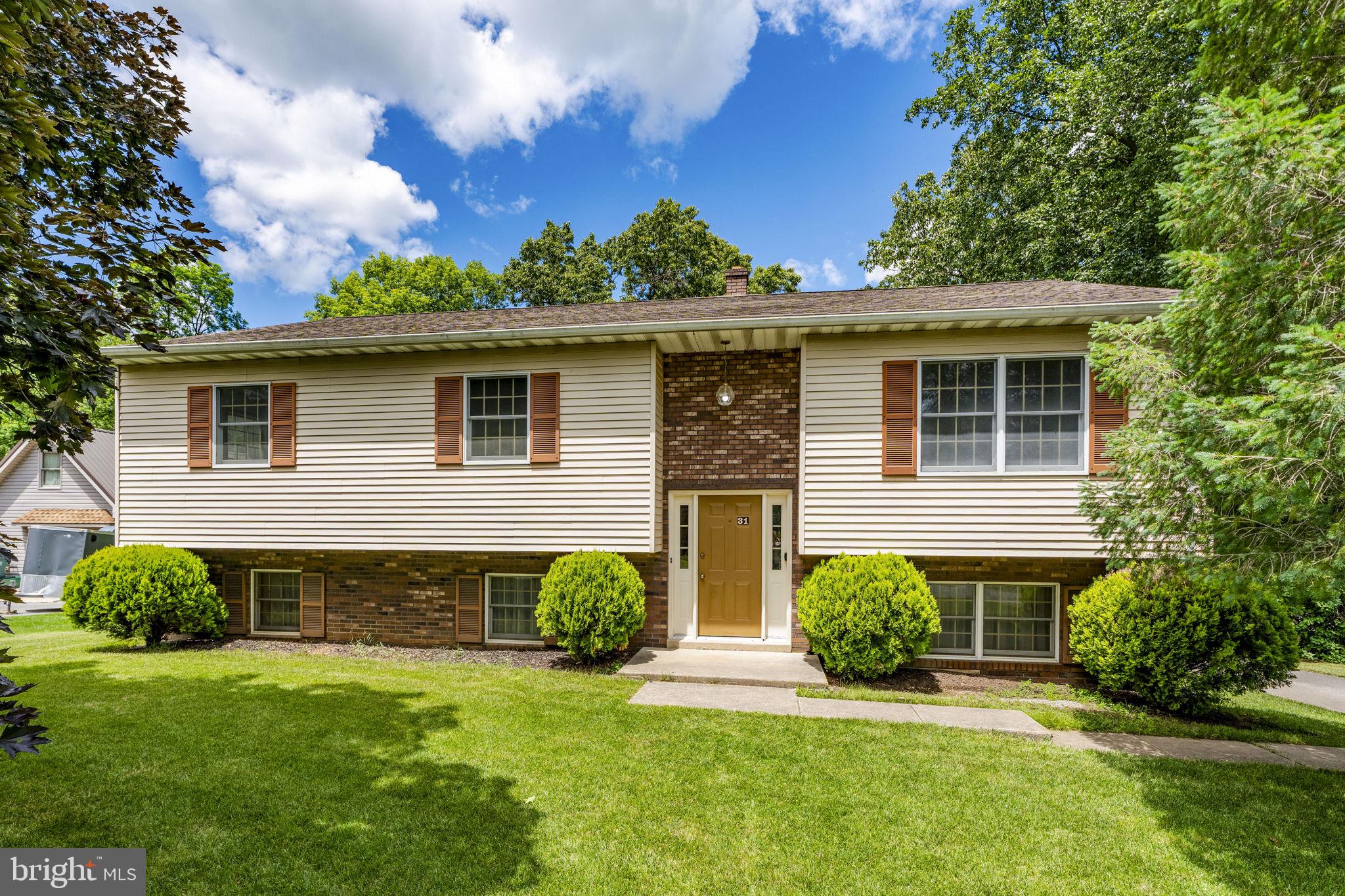 Welcome to this well-maintained 3-bedroom, 2.5-bath raised ranch located on a quiet street in New Providence. Freshly painted throughout and featuring new flooring, this home is ready for its next owner to move in and make it their own.

The main level features a spacious open-concept living room and dining room combination, creating an inviting layout that's ideal for everyday living and entertaining. The dining area opens onto a large deck, providing the perfect spot for outdoor dining, gatherings, or simply enjoying the peaceful surroundings. The primary bedroom includes a private ensuite bathroom, offering comfort and convenience. The walkout basement provides additional space for storage, recreation, a workshop, or future finishing possibilities. An attached two-car garage adds practicality and ample storage.

Situated on a beautiful lot, this property offers the opportunity to enjoy the best of Lancaster County living. Nearby farm stands and local markets provide fresh fruits, vegetables, and other locally grown products throughout the year. Enjoy country views, fresh air, and a relaxed setting while still being within easy reach of shopping, dining, and major routes.

Don't miss the chance to own this inviting home in a desirable rural setting with plenty of potential to make it your own.
Buyer should verify taxes for 2027 based on reassessment.