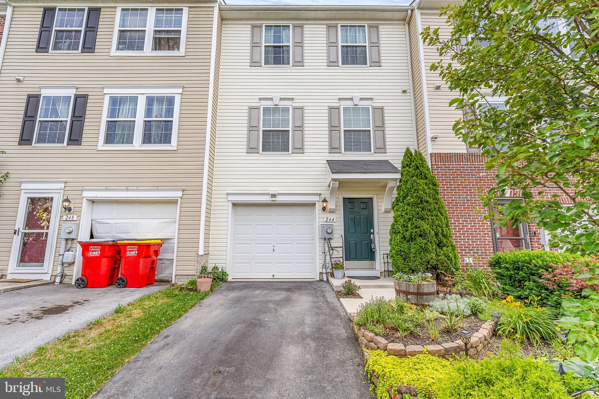 Welcome to this beautiful 3-bedroom, 2.5-bath townhouse in a highly desirable Hedgesville location. Offering three levels, this well-maintained home combines comfort and convenience.

The main level features a bright and inviting layout with a kitchen and dining area that opens onto a stunning deck—perfect for morning coffee, outdoor dining, or relaxing while enjoying the beautiful surroundings. 

Upstairs, you'll find three comfortable bedrooms. While the third bedroom was used as a closet, it can easily be converted back into a bedroom.

The lower level offers additional storage space and laundry area or the opportunity to finish the area to create a home office, recreation room, gym, or guest space.

Additional highlights include a one-car garage, attractive curb appeal and landscaping. Conveniently located just minutes from schools, shopping, dining, and major commuter routes, this home offers the perfect balance of peaceful neighborhood living and easy access to everyday amenities.