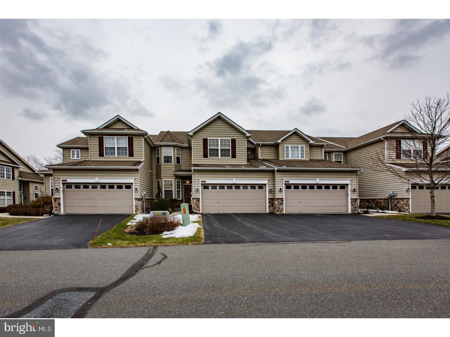 This bright and airy townhome feels like a single home once you are inside and has upgrades everywhere you look. The condition is a 10/10 by anyone's standards and will make you think it is the unoccupied model home for the community, but it isn't. Top to bottom: The second floor hosts all 3 bedrooms along with a loft area overlooking the family room down on the 1st floor.  The spacious master suite features its own gas fireplace, a huge walk-in closet with ample custom built-in shelving, and a reading/computer nook.  The en-suite master bathroom includes a double bowl vanity, jacuzzi tub and frameless glass shower that will make you think you are at a chic resort.  The 2 additional bedrooms share the second full bathroom. On the first floor, the chef in the house will love the gourmet kitchen, which comes with Corian countertops, subway tile backsplash, a double wall oven and SS appliances. From the kitchen, the open concept allows you to enjoy the happenings and views the family room has to offer, like the floor to ceiling stone gas fireplace and windows looking out to the tree lined backyard.  Ideal for entertaining, access to the raised deck is directly from the family room.  The first floor is rounded out by the dining room, ideally located off of the kitchen and formal living room which would be a great childrens play room, a half bath, breakfast nook and separate laundry room. A two-car garage, full walkout basement just waiting to be finished, custom paint colors, Brazilian hardwood flooring and upgraded light fixtures round out this one of a kind package. Oh, and the views of the sunsets are included at no extra charge. Originally built in 2005 for $342,510, this is a bargain by anyone's standards and comes with private community pool access, full lawn care and snow removal and is only minutes from 176 and the PA turnpike. This is one to put on your preview list even if you think you are not looking for townhome.