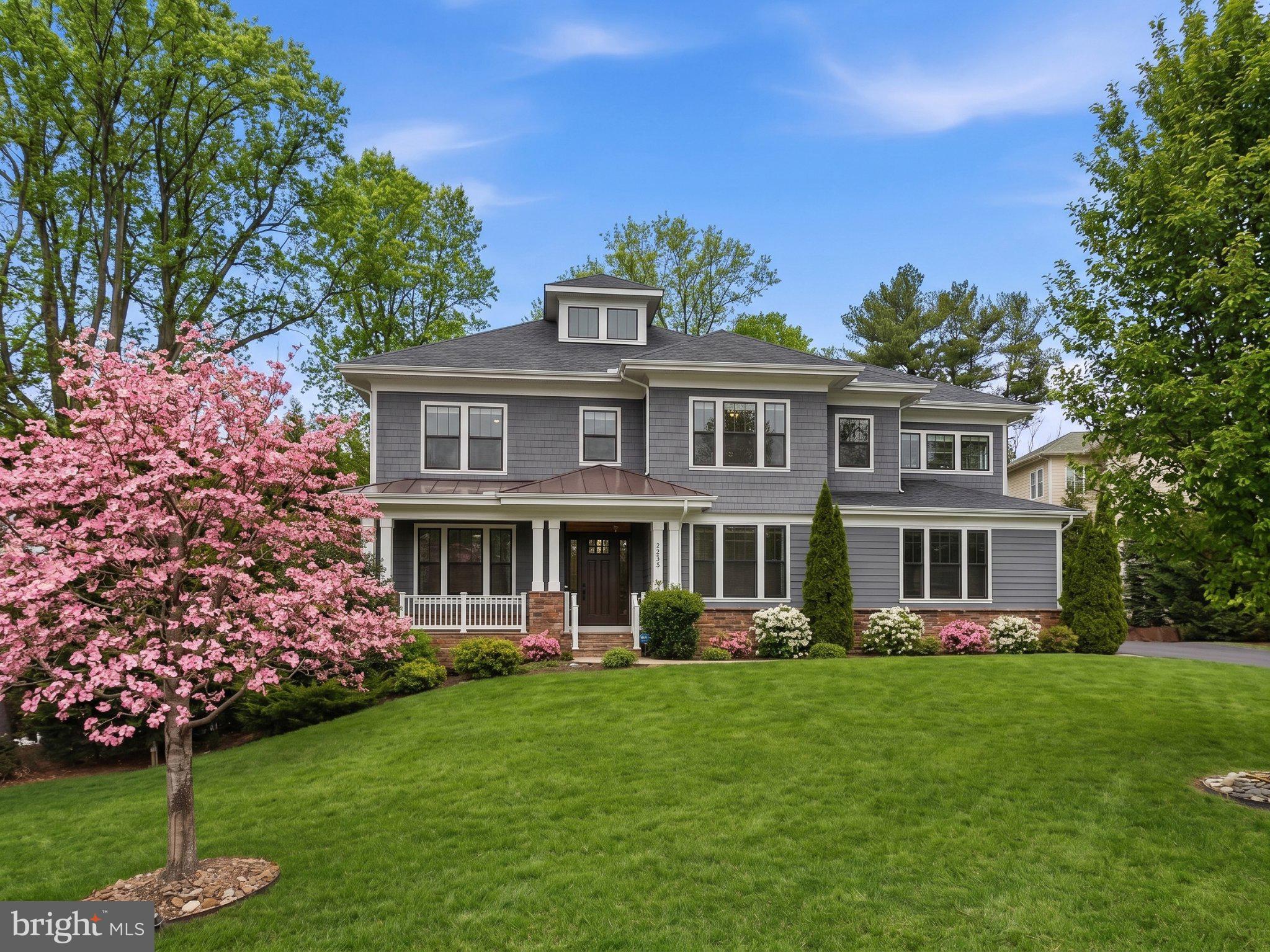 Price Improvement!  Amazing custom-built Craftsman-style home situated on a stunning half-acre homesite just outside the Town of Vienna. This exquisite residence offers approximately 7000 square feet of thoughtfully designed living space showcasing exceptional craftsmanship and timeless detail throughout.

A flagstone walkway and welcoming front porch lead to an open entry foyer flanked by formal living and dining rooms, setting an elegant tone upon arrival. The open-concept main level is anchored by an impressive great room featuring coffered ceilings, oversized windows, and seamless flow into a chef’s kitchen designed for both everyday living and upscale entertaining. Kitchen highlights include a dramatic center island with prep sink, slate countertops, Sub-Zero refrigerator, six-burner industrial-style range with pot filler, wall ovens, beverage refrigerator, custom cabinetry, butler’s pantry, and a spacious walk-in pantry. French doors open to a deck overlooking the fully fenced backyard with fire pit—perfect for outdoor entertaining.

The main level is completed by a private office and a functional mudroom with built-in cubbies and direct garage access.

Upstairs, the luxurious primary suite offers a true private retreat with two large walk-in closets, a dedicated dressing area with vanity, and a spa-inspired bath featuring dual vanities, a separate shower, and a freestanding soaking tub. Three additional bedrooms, each with its own en-suite bath, provide comfort and privacy for family and guests.

The finished walk-out lower level features tall ceilings, abundant natural light, a fifth bedroom, full bath, expansive recreation room, and generous storage space.

Additional features include hardwood floors, crown molding, board-and-batten detailing, 6-over-1 double-hung windows, zoned heating, side-entry garage, and Hardiplank and shake exterior.

Ideally located within the Oakton Elementary, Thoreau Middle, and Oakton High School pyramid, this exceptional residence at 2867 Hill Road offers a rare opportunity to own a truly distinguished home in one of Vienna’s most desirable settings. Prime location just off Route 123 with easy access to Oakton shops and dining, the Vienna/Fairfax-GMU Metro, I-66, Routes 123 and 50, Tysons, DC, and the Town of Vienna—blending suburban charm with outstanding commuter convenience.