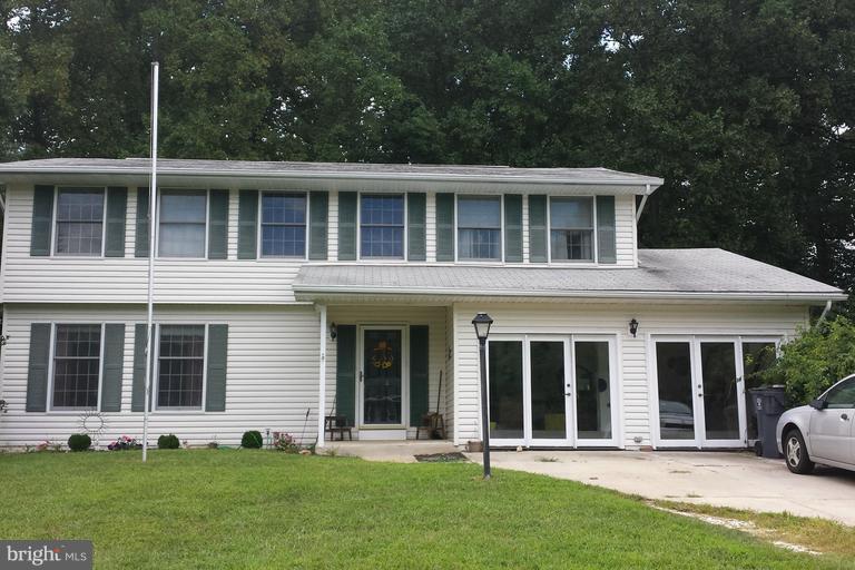 Lovely and spacious 4 BR, 2.5 bath home on nice lot with plenty of room. Finished lower level, hardwood floors, amazing kitchen, family room with additional family room to front of home. This home has a lot of room to entertain and be comfortable. Large bedroom sizes too. Make an appointment to see this home today.