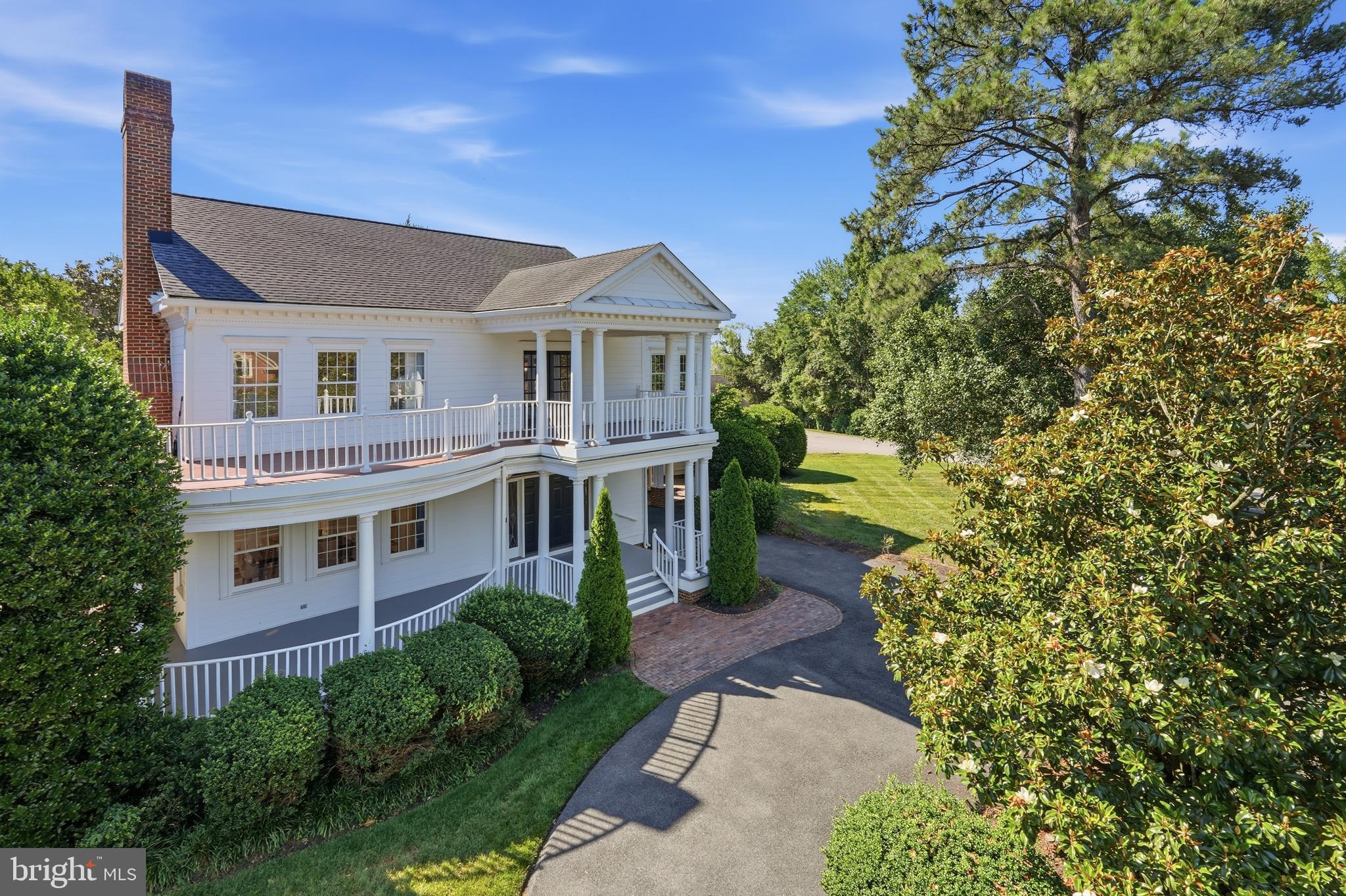 Welcome to 9505 Lynnhall Pl, a breathtaking custom-built Tidewater-style estate offering a perfect blend of historic charm and modern luxury on a private, beautifully landscaped half-acre lot near the Potomac River, on George Washington's original estate. Boasting 4 bedrooms and 4.5 baths, this turn-key Alexandria masterpiece welcomes you with stately high ceilings, elegant trim detail, and rich stained hardwood floors. The light-filled main level features a formal dining room and a spacious living room—each complete with its own cozy wood-burning fireplace. The chef's kitchen is a true centerpiece, recently upgraded with a brand-new, luxurious quartz island featuring a sleek modern waterfall edge. A private main-level study with gorgeous stained wooden built-ins provides an ideal work-from-home retreat. Upstairs, the expansive owner’s suite boasts stunning river views, a sitting area, a walk-in closet, and a designer en-suite bath with a classic clawfoot tub.

Outdoor living is equally spectacular. Step outside to a massive two-story veranda and a sprawling rear deck. Recent exterior upgrades include completely reworked, painted, and sealed siding to preserve the home's classic architecture, along with a brand-new privacy fence enclosing the entire perimeter to create your own secluded oasis. A detached two-car garage completes the property.

Located in the highly sought-after 22309 zip code, this home offers an unparalleled lifestyle. Enjoy premier access to the Mount Vernon Country Club and Belle Haven Country Club for championship golf and upscale social amenities. Outdoor enthusiasts will love being minutes from the scenic Mount Vernon Trail, Fort Hunt Park, Grist Mill Park, and the Mount Vernon RECenter. Zoned for Washington Mill Elementary, Whitman Middle, and Mount Vernon High. Enjoy nearby culinary favorites like Cedar Knoll, Mount Vernon Inn, and River Bend Bistro. With an easy commute to Fort Belvoir, Old Town Alexandria, and Washington D.C., this estate is a rare find. Schedule your showing today!