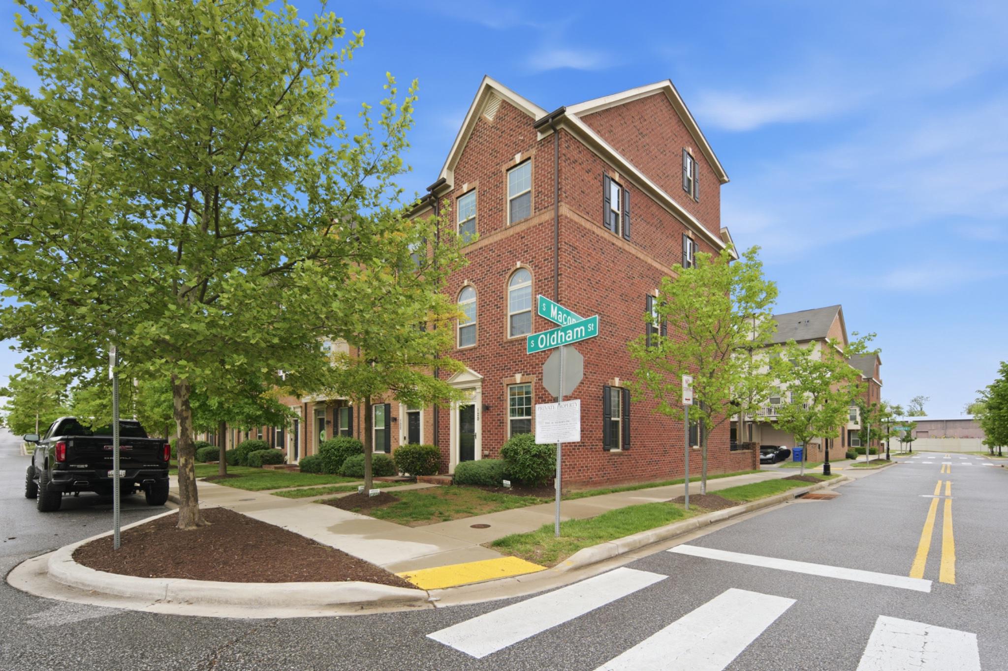 Nestled in the desirable Oldham Crossing community, this exquisite 4 level end-of-row townhouse offers a harmonious blend of contemporary design and luxurious living.  Showcasing style, warmth, and charm, this meticulously maintained home features four spacious bedrooms and four elegantly appointed bathrooms, ensuring comfort and privacy for all. Step inside to discover an inviting main floor open floor plan adorned with crown moldings and recessed lighting, creating a warm ambiance throughout. The gourmet kitchen, equipped with stainless steel appliances and upgraded countertops, seamlessly flows into the dining area, perfect for entertaining. Retreat to the primary suite, complete with a frayed ceiling and a spa-like bathroom featuring a dual walk-in shower and double vanity.  There is a 4th large bedroom with ensuite full bath on the 4th floor perfect for a guest suite.  Additional highlights include a finished garage complete with LED lighting, energy-efficient windows, and a state-of-the-art security system, ensuring peace of mind. Outside, a charming deck invites you to unwind and enjoy the urban surroundings. With an attached garage and driveway parking, convenience is at your fingertips. The owners have upgraded all of storage spaces with LED lighting and wood on the walls.  The community offers comprehensive lawn maintenance services, allowing you to savor a low-maintenance lifestyle. Located just minutes from the airport and public transportation, this home provides easy access to the vibrant city life while offering a serene retreat.  Convenient to all major travel routes (I-95, I-895, I-695, and all of the main City thoroughfares), this home is just perfect!   Experience the perfect blend of luxury and comfort in this exceptional property.