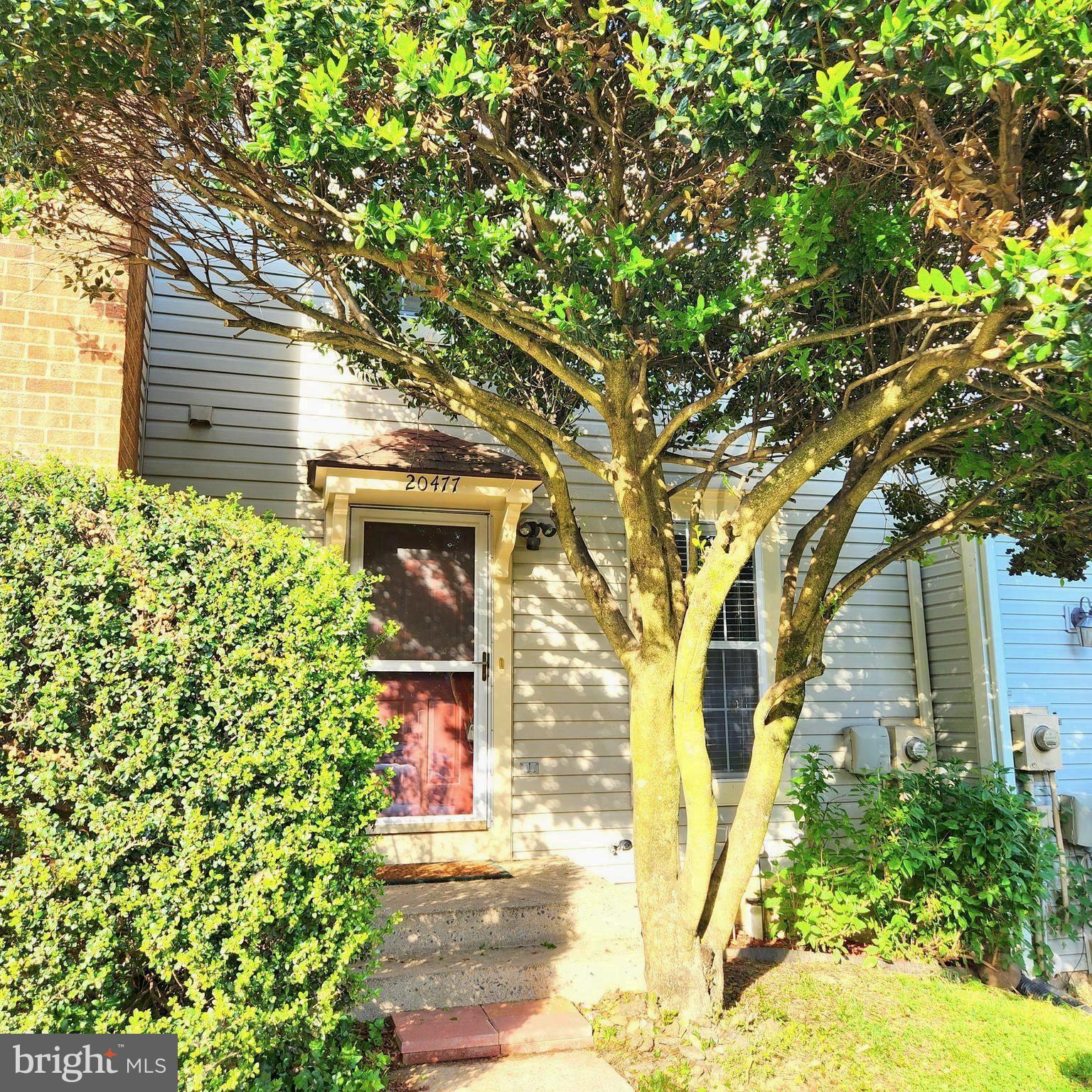 Lovely townhome tucked away in a quiet section of Waters Landing. The main floor features a spacious kitchen and a living/dining room combo with direct access to a private deck and wooded views.  There is also a convenient half bath off the entry foyer. Upstairs provides two large bedrooms both with double closets, one with direct access to a shared bath and the other with vaulted ceilings. The large full bath includes a soaking tub and separate walk-in shower. The finished lower level has a wood burning fireplace, laundry and plenty of storage space. Updates include new flooring, new kitchen appliances and fresh paint throughout. Easy parking including an assigned spot directly in front of the home and plenty of visitor parking.