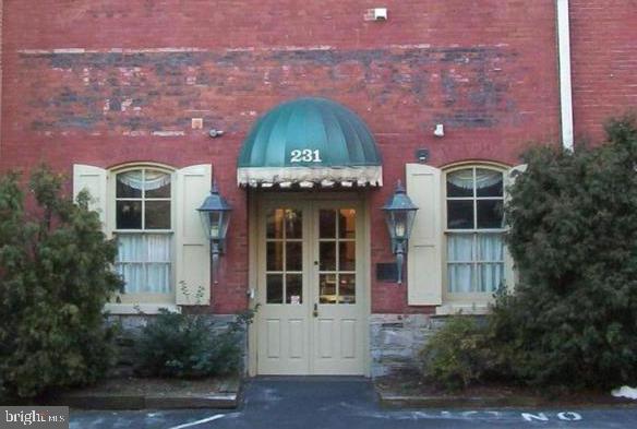 Simple condo living! This former industrial building still shows its old world charm with open floor plan, exposed original wood beams, Original HW floors, large windows and high ceilings.  Never shovel snow or worry about parking with a large private parking lot. All exterior maintenance covered by the HOA. Walk to Musser Park and Downtown attractions. Set in the Tobacco Ave Arts District; this locale won't leave you wanting for art or culture.