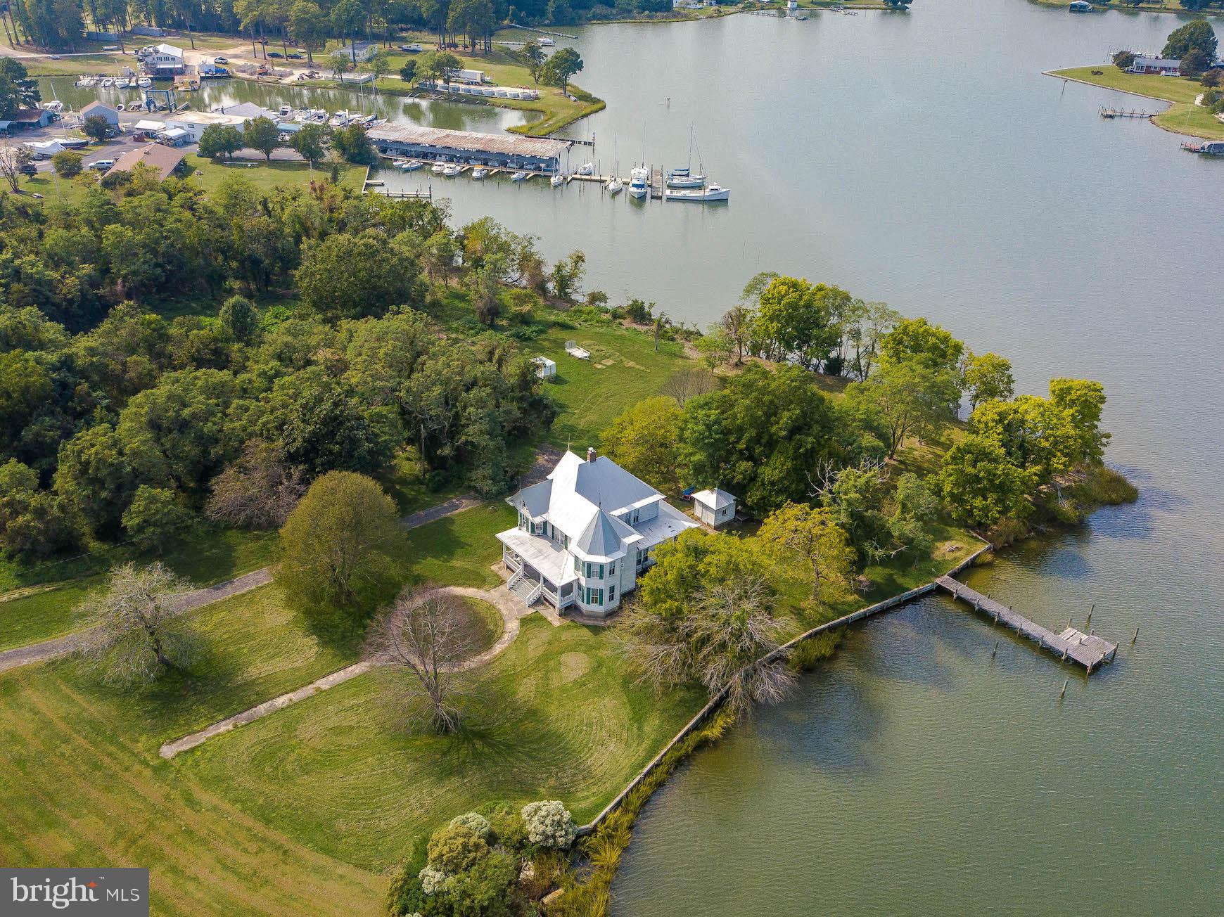 Original home of Captain Palmer, this historic waterfront home is on over 4.5 acres, partially wooded.  Sited on a peninsula with wide views and ample linear frontage on the beautiful St. Patrick's Creek,  you'll have quick access directly to St. Clements Bay and the Potomac River.  Two full-service marinas are nearby.  Deep water, and sweeping views make this an ideal property for a permanent or vacation home.  This beautiful Victorian home offers large room sizes, period millwork, wood flooring, great front porch, space to spread out and enjoy boating, serene waterfront living and nature's bounty.  Seller has an approved permit for a 50’ pier extension with lift.  This property is listed on the MD Inventory of Historic Properties (MIHP),   Refer to St Mary’s County Land Use & Growth Management (LUGM) for any restrictions, if any, on changes or demolition.  Property being sold as-is.