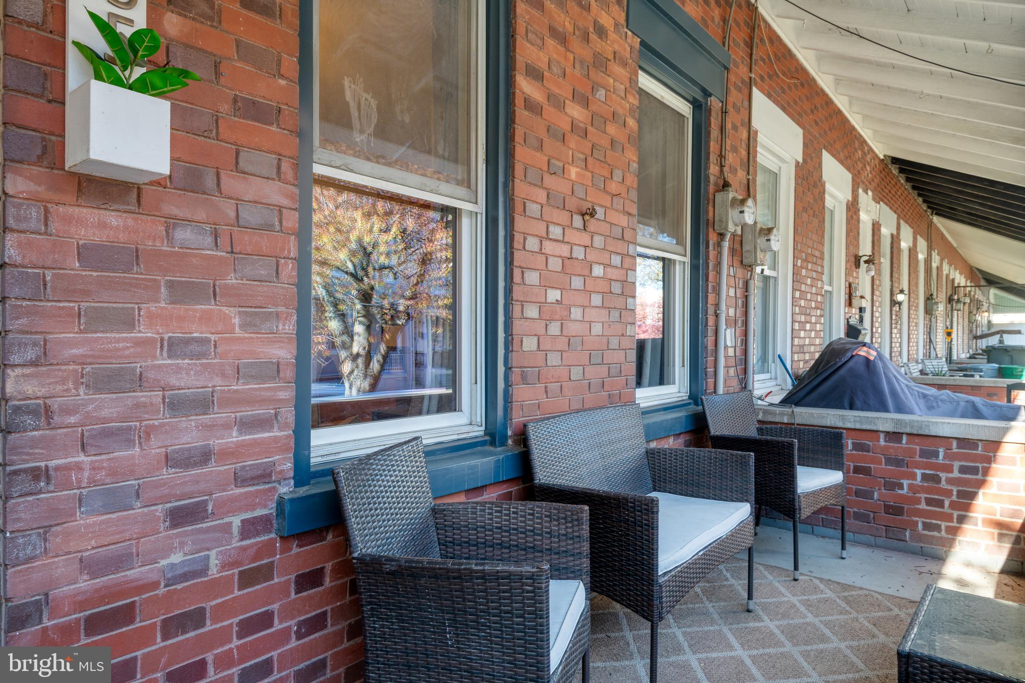 Come see this recently remodeled townhouse located in Lancaster City! This home features refinished wood floors, vinyl flooring, and updated lighting and plumbing fixtures. The interior is bursting with charm- from exposed brick walls and chimney to custom made open shelving. On the 1st floor, you’ll ll find a living room and dining room, accented by the exposed brick walls, updated kitchen with granite and wood counters, an island, shiplap walls, and stainless steel appliances. There is also a convenient powder room on the 1st floor, and a mudroom with access to the fenced in backyard.  On the 2nd floor, you ll find (3) sizable bedrooms with more exposed brick, a beautiful bathroom with tiled shower, ceramic flooring, and double bowl vanity. There is also a laundry area conveniently located on the 2nd floor. Other recent improvements include central air and roof.