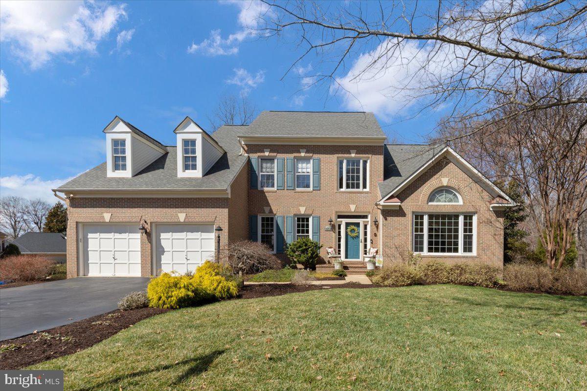 Tucked away on a peaceful cul-de-sac, this exquisite five-bedroom home offers a perfect blend of sophistication and comfort. As you step through the front door, you’re greeted by gleaming hardwood floors and a breathtaking two-story foyer. The open and airy design leads seamlessly into the family room, where a warm wood-burning fireplace creates an inviting ambiance, while the beautifully appointed kitchen flows effortlessly into the space—perfect for both everyday living and entertaining.

The main-level primary suite is a private retreat with beautiful ensuite luxury bath, and a stately home office sits at the front of the house, offering a distinguished workspace or a library.  Upstairs, three spacious bedrooms and two full baths provide comfort and privacy, while the lower level features a fifth bedroom, an additional bath, and an expansive entertainment area that opens to the lush backyard. A breathtaking two-level deck with a gazebo overlooks the serene, tree-lined landscape, creating an idyllic outdoor escape.

Located just 30 minutes from Washington, D.C., in a sought-after community with a pool, tennis courts, and a clubhouse, this home is a rare gem that exudes elegance and modern convenience.