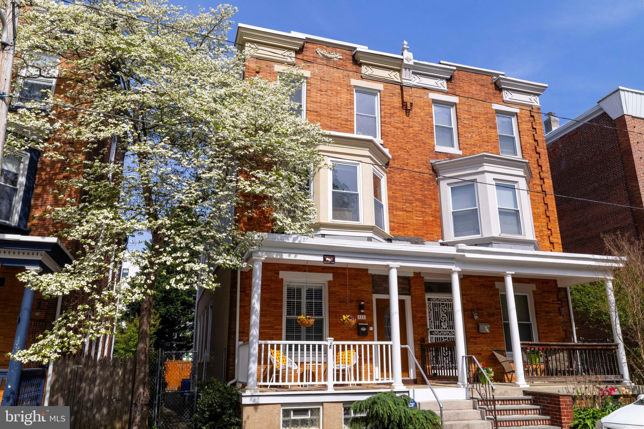Welcome to 111 W. Gorgas Lane, a light-filled 4-bed, 2.5-bath brick twin in West Mt. Airy! Completely renovated and beautifully maintained since, the home has been mostly rebuilt with recently installed systems and a modern, open concept floor plan, while also retaining many of the  charming original details. The house has great curb appeal with a lovely covered front porch and a facade mixing elements of both the Georgian and Victorian architectural styles. Upon entering, you'll find a living room with hardwood floors, a decorative fireplace, chair rail molding, and baseboard trim. The dining room and kitchen flow directly from here, both bathed in sunlight thanks to deep window sills that are the perfect spot for a plant lover's ever-growing collection. Beyond this is a large eat-in kitchen with pendant lighting, stainless steel appliances, a 5-burner gas range, black granite countertops, and breakfast bar. Just past the kitchen lies a powder room and large mudroom with rear access to the private fenced-in backyard and patio. The second floor features a large primary bedroom, with a walk-in closet, and an en-suite bathroom with a step-in shower. Down the hall you’ll find another full 3-piece bathroom with a shower tub combo and tiled floor. Next to the bathroom is a large second bedroom with a bay window overlooking the street -- this would also make a fantastic library, office, or workout room! Head up to the third floor and you'll find two additional well-proportioned bedrooms. The fully finished basement provides the perfect place for a family room or play space, as well as a laundry center and room for your storage needs. Central A/C and ceiling fans throughout keep you cool in the summer and offer the possibility of being more energy-efficient. Located on a hidden one-way street, it’s just a short walk to two nearby SEPTA train stations: Carpenter Lane and Richard Allen Lane (with on-site High Point Cafe, a neighborhood favorite for coffee, crepes, and delicious baked goods!). Mt. Airy Breakfast Boutique, Malelani Cafe, Lovett Library, and the shops and restaurants of Germantown Avenue are just blocks away, making this location quite walkable and pedestrian-friendly. Schedule a showing for this Mt. Airy gem today!