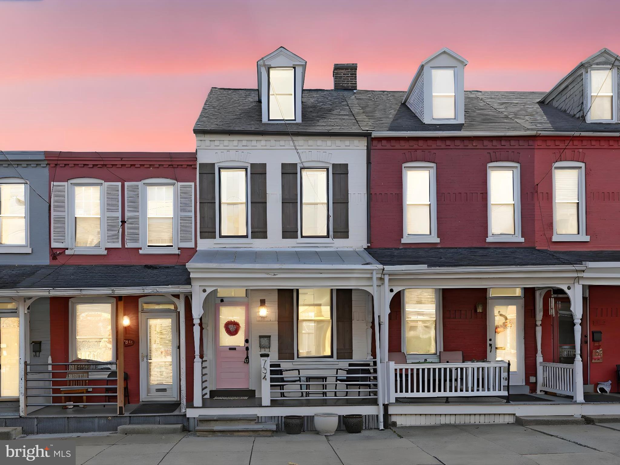 OPEN HOUSE SATURDAY 1-2:30pm! This move-in-ready townhome is ideally located in the vibrant Chestnut Hill within walking distance to F & M University and downtown Lancaster.  The home has been thoughtfully updated with a perfect balance of creativity and practicality. From the welcoming front porch, step into a beautifully designed living and dining area where exposed brick walls and ceiling beams create a warm, inviting atmosphere, ideal for entertaining. The home features durable, easy-to-maintain luxury vinyl plank flooring throughout.  The modern kitchen is a chef's delight, with a stylish combination of cabinetry and open shelving, complemented by a sleek tile backsplash that extends to the ceiling, and equipped with stainless steel appliances. A convenient half bath is also located on the main floor. Step out onto the covered back porch to enjoy your morning coffee while overlooking the charming backyard.  The second floor offers two spacious bedrooms and a full bathroom with a tiled shower, as well as a thoughtfully placed laundry area for added convenience. The third floor houses a cozy bedroom retreat, perfect for guests or a private workspace. With economical natural gas heating and central air, this home provides comfort and efficiency, making it a must-see!