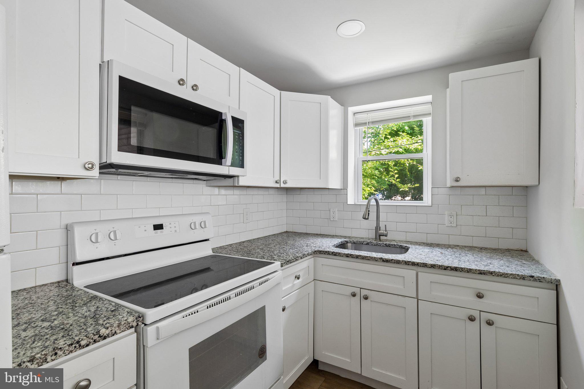 Welcome to this two-unit property in the Carroll Park neighborhood, offering great versatility and space. Unit 1 features a cozy one-bedroom layout, a full unfinished basement for additional storage or potential expansion, and exclusive access to a private backyard. Unit 2 offers a bright and spacious two-bedroom design, complete with a deck perfect for relaxing or entertaining. Whether you're looking for a smart investment or a comfortable living space, this property has something for everyone! All square footage numbers are approximate and should be verified by the buyer. It is the responsibility of the buyer to verify real estate taxes. Photos are from previous listing.
