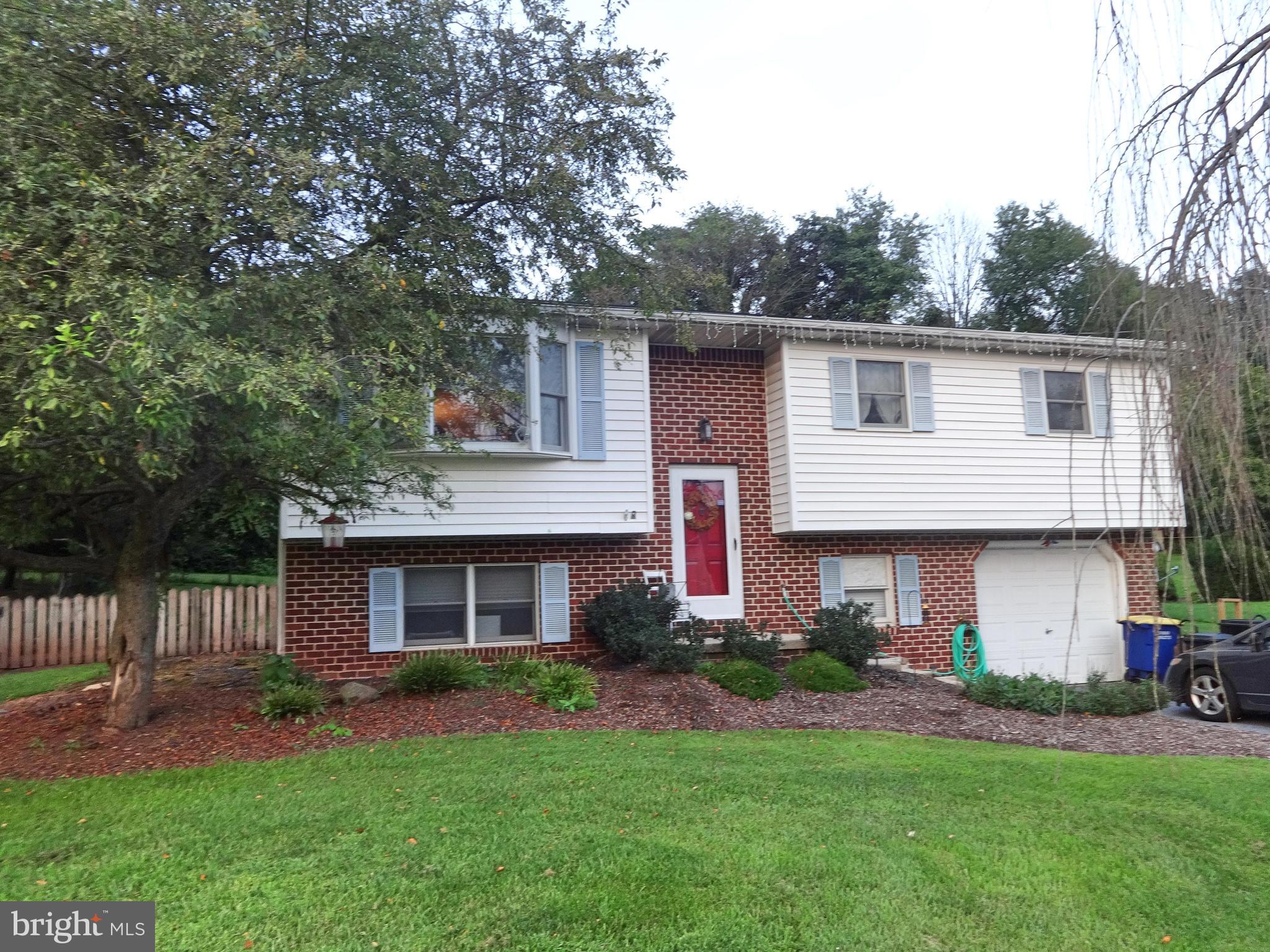Fantastic 3Bdrm/2.5 Bath Slpit Folyer on large lot. The property is all you can ask for. You will enjoy the evenings on the private deck overlooking the fish pond and fenced back yard. Inside you will feel at home with the inviting decor and colors. Make it a dinner and movie night with the large dining area that is open to the living room. In the kitchen you will find upgraded cabinets with hard wood flooring and all the conveniences of a full appliance package. Relax in you own bedroom oasis with the BIG master bedroom with master bath and whirlpool tub. Entertain family and friends in the lower level family room with the warmth a wood stove. Work on all your projects in the shop area and take the large storage area with outside door and build you own media room, game room, a 4th bedroom or even a larger Family Room. This home is not to be missed.Located close to Route 83 and Route 15. You will be minutes from York, Harrisburg and beyond. A great location for commuting.