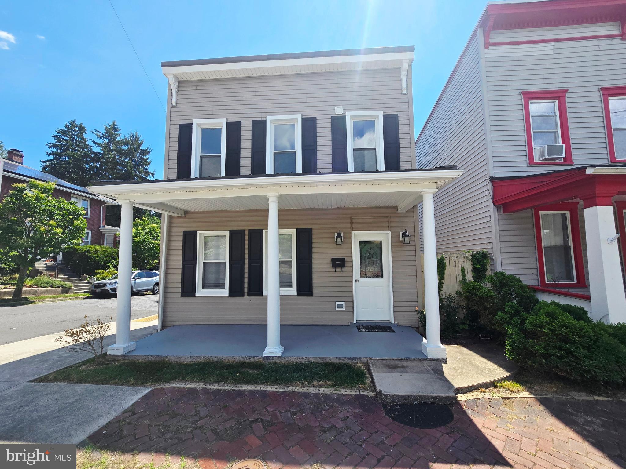 Incredible opportunity on the West Side! This beautifully updated 3-bedroom, 1.5-bath home delivers layout conveniences that are hard to find in the city. The main level boasts a spacious, open living/dining room combo that seamlessly transitions into a sleek, updated kitchen complete with modern appliances. Upstairs, the smart floor plan positions the dedicated laundry area right next to the bedrooms for ultimate everyday utility! Outside, enjoy the classic Cumberland lifestyle from your covered front porch or unwind in privacy on your rear patio. Turn-key, practical, and full of charm—229 Carroll St is ready for its next chapter.