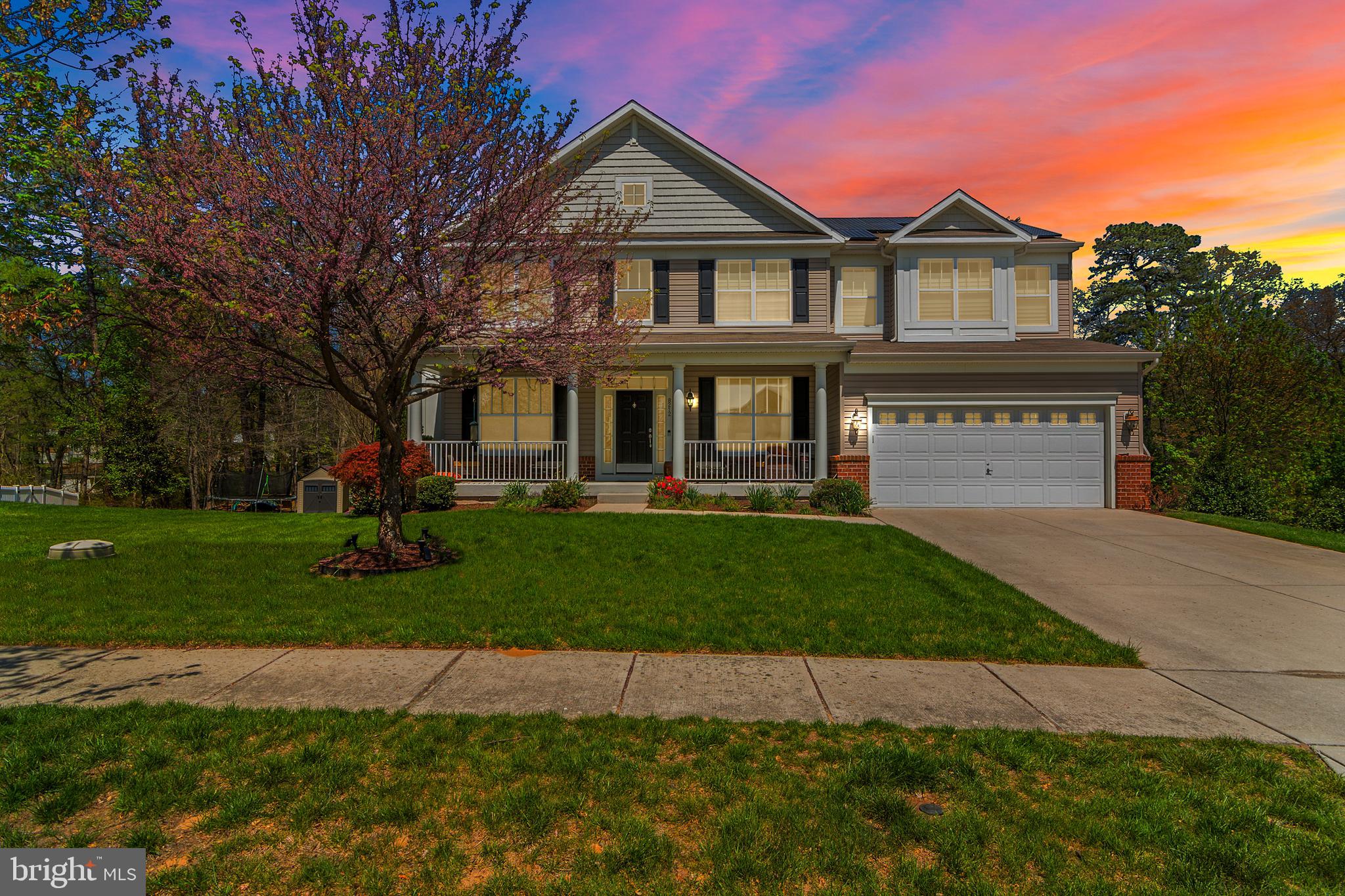 This stunning home feels like brand-new construction and exudes luxury at every turn. From the moment you arrive, you’re greeted by meticulously designed landscaping that sets a tone of timeless elegance.

Step into the sun-drenched two-story foyer, where rich hardwood floors flow seamlessly throughout the main level. A dedicated office with doors offers the perfect space to work from home, while the serene backyard views beckon you to unwind on the expansive stone paver patio. Surrounded by hemlock trees and adjacent to a tranquil forest preserve, this outdoor oasis is perfect for relaxing or entertaining. The patio features a built-in gas line for your grill—no more propane runs!—and irrigation throughout the property ensures your lawn stays lush with minimal effort.

The kitchen is a chef’s dream, featuring a gas stove, gleaming white granite countertops, and sleek white cabinetry with custom organizers for a fresh, modern look. After dinner, cozy up by the gas fireplace in the living room, where large windows offer peaceful backyard views.

Upstairs, the primary suite is a true retreat with cathedral ceilings, two custom walk-in closets, and a private sitting area that can flex to fit your needs. The spa-inspired en suite bath boasts a luxurious custom glass shower. A laundry chute leads directly to the fully equipped laundry room on the main floor for added convenience.

Three additional spacious bedrooms and a full bathroom complete the upper level. Downstairs, the fully finished basement offers even more living space, including a full bath, an exercise room, an entertainment area, and a staged sleeping nook—perfect for guests or gatherings. Dual walkouts lead directly to the patio.

Eco-conscious buyers will love the owned solar panels, providing both sustainability and energy efficiency.

Beauty, tranquility, and modern comfort—all under one roof. Welcome home to 8212 Running Spring Circle.