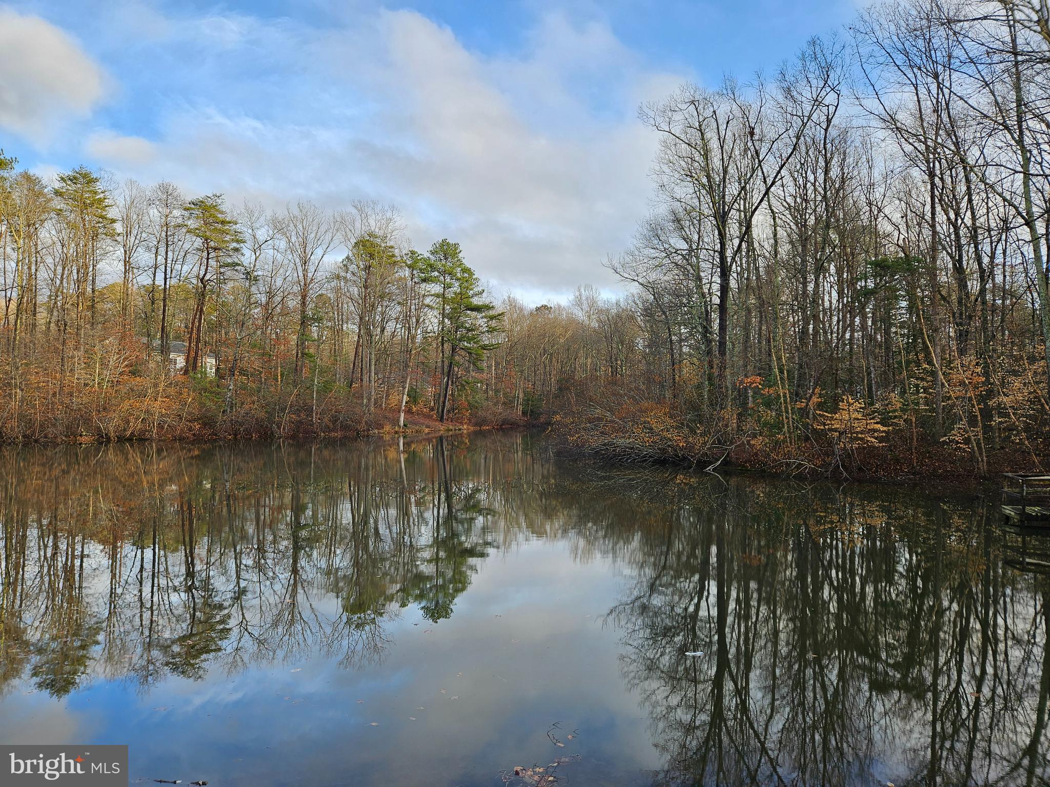 Waterfront lot on the Land 'Or side. Approx. 1/4 mile from the entrance gate on the left. Just a straight shot to the lot. All wooded. Create the setting of your choice. Verify HOA dues.