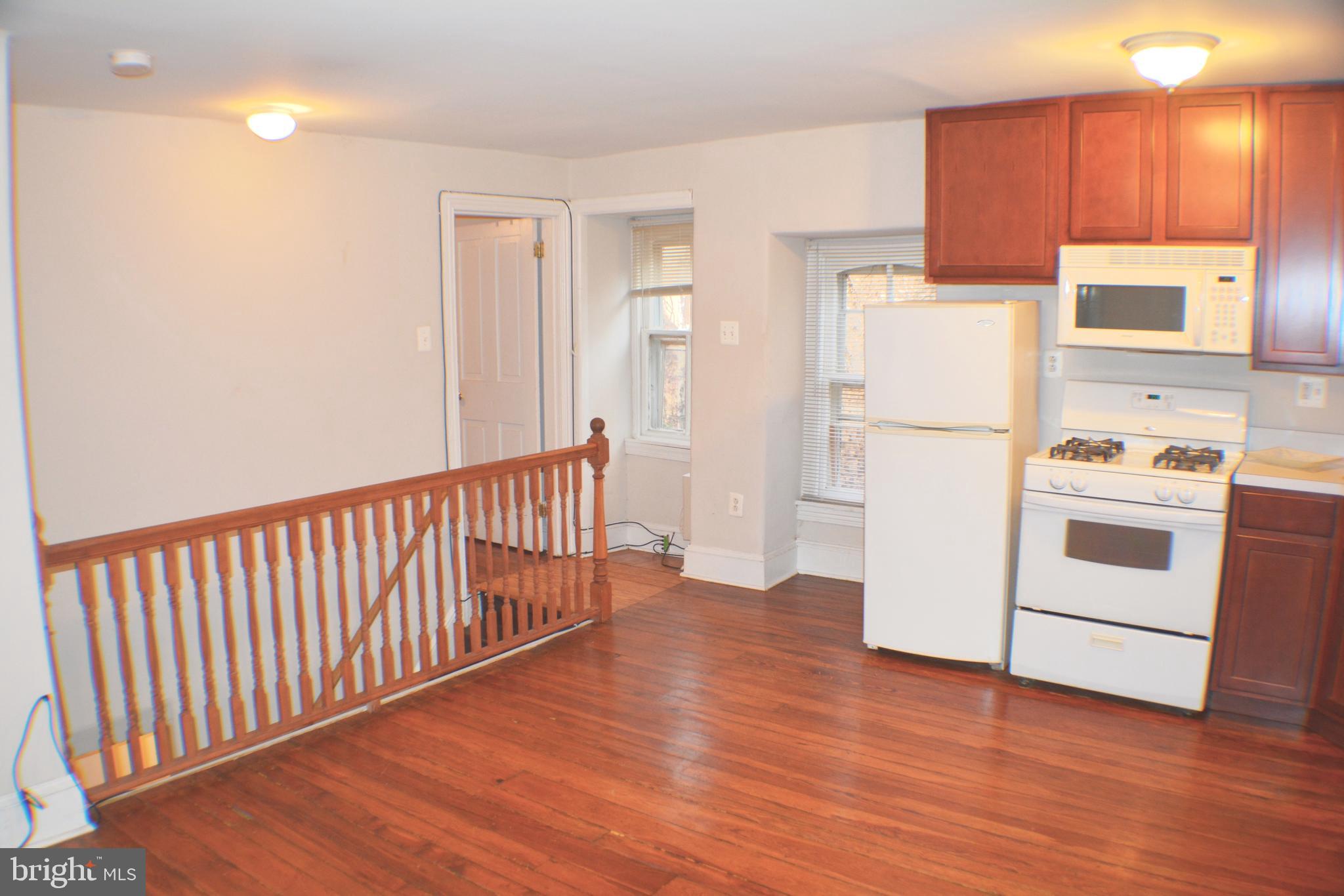 Wonderful open concept, loft-style apartment on tree-lined block of historic Germantown. Tenants only pay electric; heat, cooking gas and water included. Hardwood floors throughout. Fully equipped kitchen with refrigerator, gas range, microwave, dishwasher and garbage disposal. Large bedroom has en suite bathroom with claw foot tub and tiled floor. Washer and dryer in building. Off street parking. Cat friendly with no fee! Reach out for applications and showings. Good credit over 650 is required. First, last and one month security due at lease signing. Available Sept 20. Ask about the video tour!