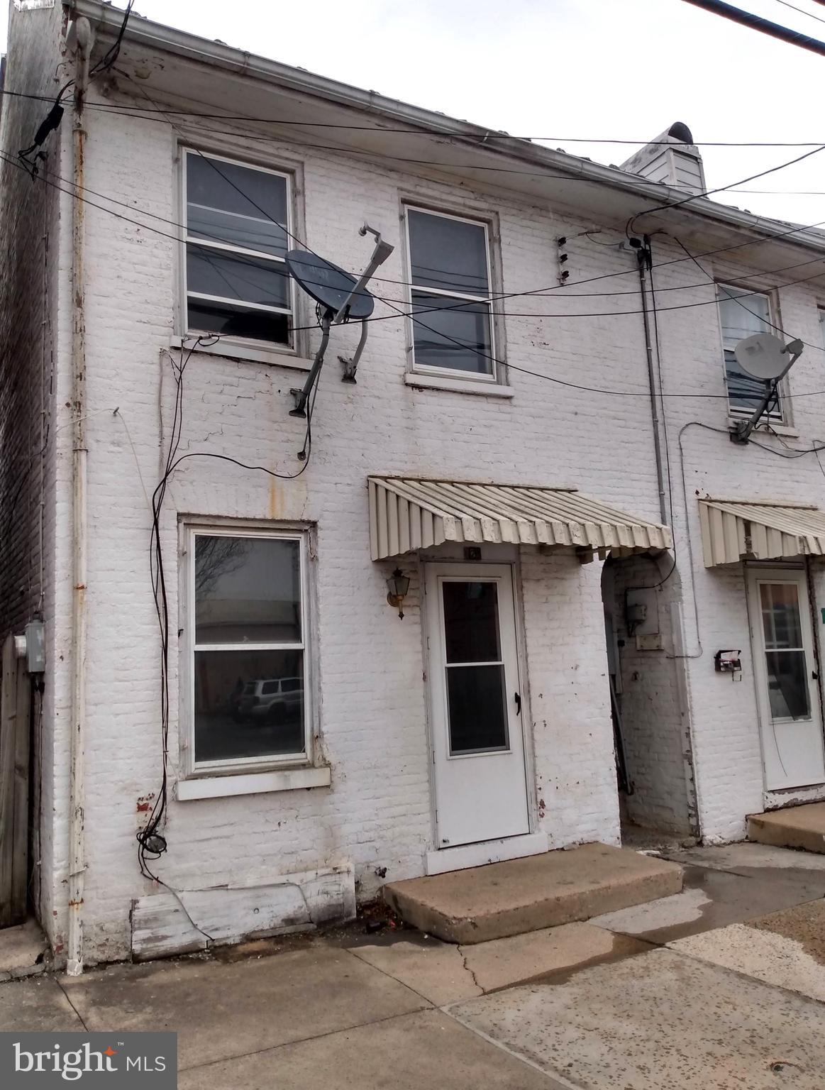 INVESTMENT OPPORTUNITY! This 3 bedroom 1 bath features: nice sized kitchen;  large bedrooms; main floor laundry room; detached garage with alley access; and more.  Convenient borough location and setting on a lot with a back yard that backs up to the cemetery.  NOTE: This property can be purchased by itself or part of a tri-plex package...see MLS# PAFL2034726.  It will need renovations and will not qualify for Government backed loans. Property is being sold "AS-IS".