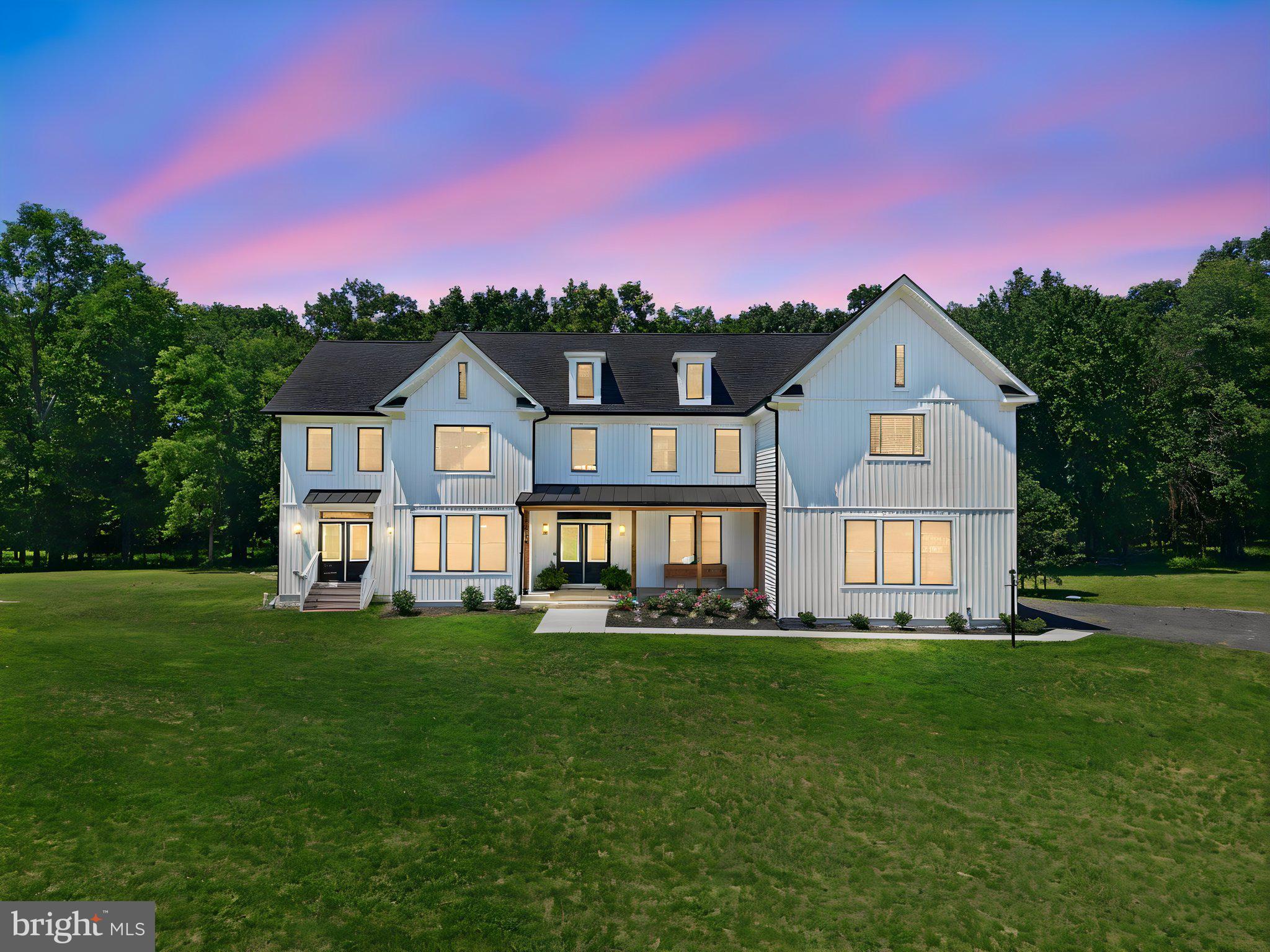 Welcome to a rare offering of space, privacy, and craftsmanship on nearly 8 flat, treed acres, positioned on the DC side of Warrenton for an easy commute without sacrificing the countryside's space and serenity. With underbrush cleared throughout the wooded lot, this property offers usability alongside its natural beauty — including ATV trails, abundant wildlife, and privacy — all just minutes from town. Spanning 8,083 total finished square feet across three levels, this custom home offers 6 bedrooms, 6 full baths, and 1 half bath, with effortless flow between formal and everyday living spaces. The main level offers a formal dining room, a private office, and an expansive sunroom filled with natural light. The family room features soaring ceilings and an electric fireplace, opening to a gourmet kitchen outfitted with granite countertops and a full Thor appliance suite. A butler's pantry/mud room connects seamlessly to the kitchen, while the breakfast room overlooks the treed rear lot — the perfect spot for morning coffee. Upstairs, the primary suite is a true retreat, with its own electric fireplace, a morning bar with a mini fridge, four closets (one with a convenient laundry hookup), and a luxurious ensuite bath. Three additional bedrooms are each ensuite, and two include private sitting rooms — ideal for guests, multigenerational living, or a flexible home office. The finished walkup lower level extends the living space even further, with a large recreation room, a bar featuring a full-size fridge, a full bath, and a spacious bedroom. Additional finished space offers flexibility for use as a media room, 2nd office, home gym, or storage. Additional highlights: no HOA, giving you full freedom to enjoy the land as you wish, and a completed home inspection (May 2026) available for buyer review. Just minutes from Old Town Warrenton, enjoy easy access to shopping at Warrenton Village Center and Northrock Shopping Center (Harris Teeter), acclaimed local dining like Denim & Pearls and Nash & Smashed, and recreation options including the Warrenton Aquatic and Recreation Facility and Fauquier Springs Country Club — all while coming home to country privacy. This is a rare combination of acreage, craftsmanship, and commuter convenience — schedule your private showing today.