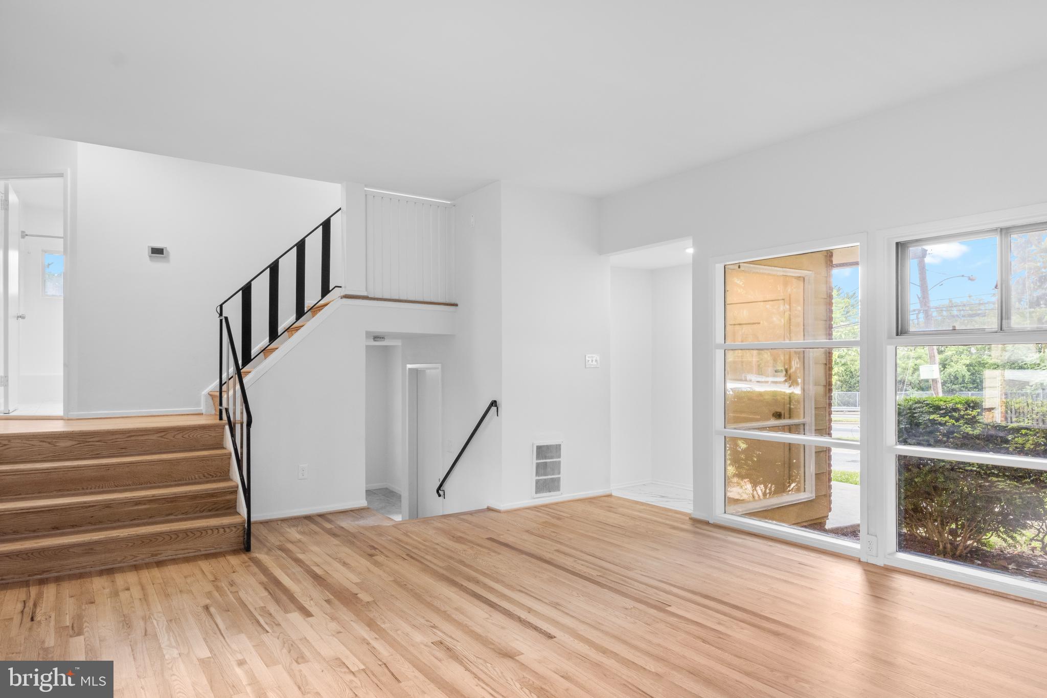 Welcome home to this beautifully refreshed split-level nestled in one of Rockville's most convenient and desirable neighborhoods. Offering nearly 2,000 square feet of bright, inviting living space, this move-in ready home features 3 spacious bedrooms, 2 bathrooms, and the perfect blend of timeless charm, modern updates, and everyday functionality.

Natural light fills every level, showcasing refinished hardwood floors, fresh designer paint, updated lighting and fixtures, refreshed bathrooms, and stylish finishes throughout. The thoughtfully designed floor plan offers multiple living spaces, including a welcoming living room, formal dining room, spacious family room with walk-out access to the backyard, and a finished lower level that provides endless possibilities for a recreation room, home office, fitness area, or additional entertaining space.

The bright, functional kitchen has been refreshed with new appliances and flows seamlessly into the dining room, where elegant French doors open to a beautiful backyard patio; perfect for outdoor dining, entertaining family and friends, or simply enjoying a quiet morning coffee.

Recent improvements provide added comfort and peace of mind, including a recently updated HVAC system, new kitchen appliances, refreshed bathrooms, refinished hardwood floors, updated flooring, stylish fixtures, and fresh interior paint throughout.

Outside, enjoy a private driveway with ample off-street parking, mature landscaping, and a spacious backyard designed for entertaining, gardening, or everyday relaxation.

Perfectly positioned just minutes from Rockville Town Square, Twinbrook Metro Station, and the shopping, dining, and entertainment along Rockville Pike, this home offers exceptional convenience. Enjoy walking distance to grocery stores, restaurants, parks, the Rockville Memorial Library, and Montgomery County Public Schools, with quick access to I-270, MD-355, and the ICC (MD-200), making commuting throughout the Washington metropolitan area effortless.

Combining modern updates, flexible living spaces, abundant natural light, and an unbeatable location, this exceptional Rockville home is ready to welcome its next owners.