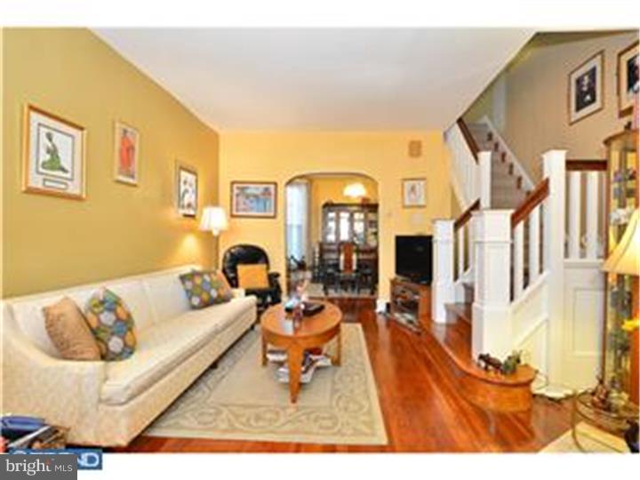 Welcome to your new home! Walk up through your deep front yard with perennial plantings, onto your covered front porch and enjoy the view of your well kept neighborhood. This well maintained and updated home has a vestibule entrance with glass door, finished hardwood floors security system, separate dining room with glass chandelier, large eat in kitchen with bead board ceiling, white cabinets, gas cooking and entrance to basement and back yard. The back yard is over 20 feet deep with mature shade trees, grass and plenty of space for additional plantings, a patio or barbeque area. The basement is clean and dry with laundry area, exit to back yard, mechanicals, storage, extra spray insulation, drop ceiling and subpump. Upstairs you have a large bath and three good sized bedrooms with lots of light, wall to wall carpet and energy efficient replacement windows. Nothing to complain about and priced to sell, this house is ready for you to come and make it your very own!