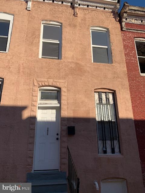 Newly renovated 2BR 1BA home.  Large living room and dining room.  Big kitchen with plenty of cabinet space.  Washer/dryer hook-up in kitchen.  Great rental home.  Rent includes water.  Parking pad in rear of home. Close to transportation, shopping and restaurants.