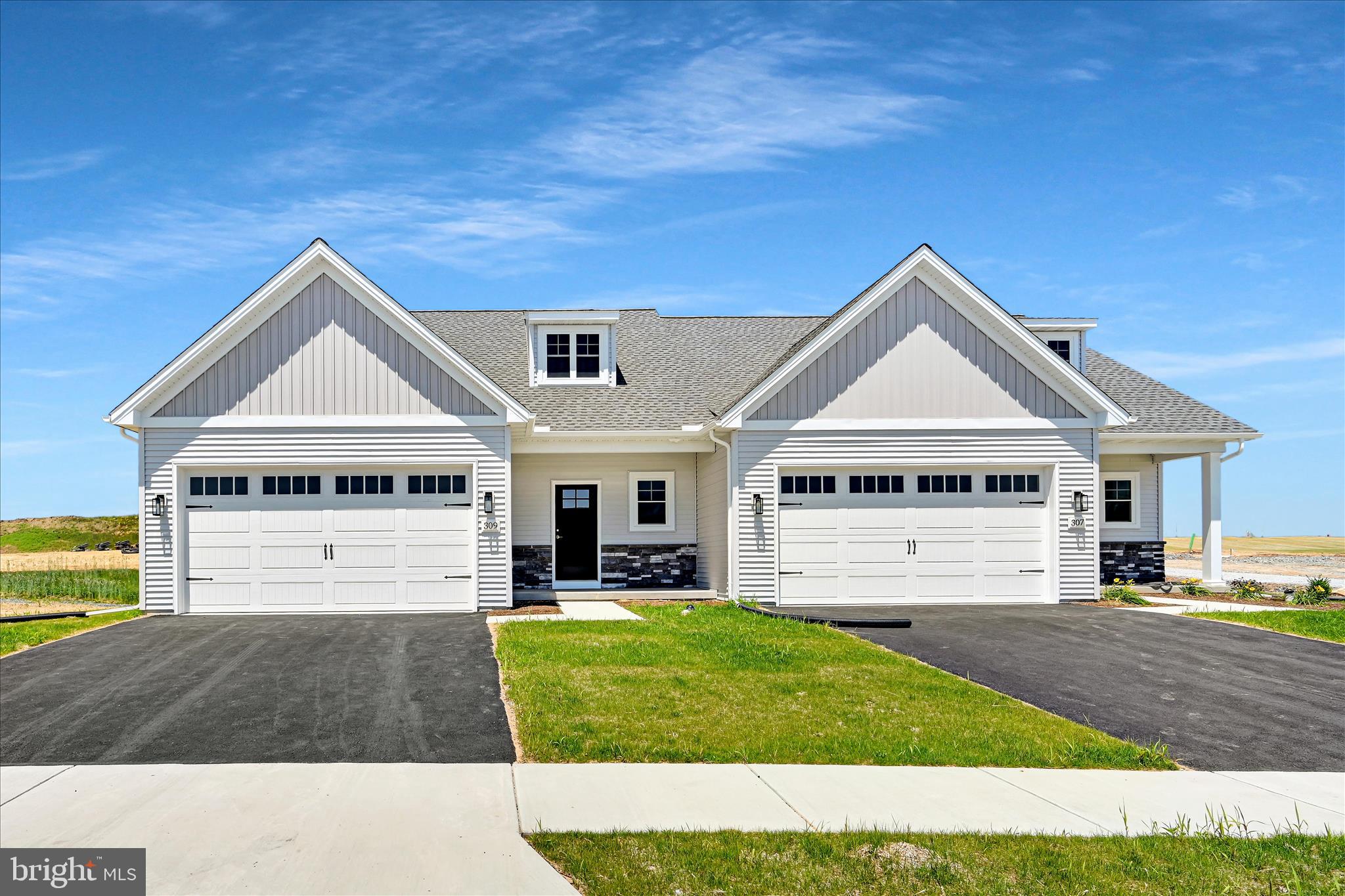 READY NOW!  New Phase of StoneyBrook Development in Elizabethtown! Discover easy, maintenance-free living in this exciting new phase of the StoneyBrook community, featuring 44 beautifully designed duplex homes. The Bakersfield floor plan offers a first-floor primary suite complete with a walk-in closet, a luxurious en-suite bath featuring a 5-foot tile-surround walk-in shower, and a double bowl vanity. The open-concept main level includes a spacious kitchen with 42-inch cabinets, a large 5-foot island, and a pantry, flowing seamlessly into the dining area and family room—perfect for entertaining. Additional conveniences include a first-floor laundry room and a half bath. Upstairs, you’ll find two additional bedrooms, a full bath, and a versatile loft area. Enjoy scenic views from your rear patio or deck and take advantage of the neighborhood’s extensive paved walking trails. Snow removal and lawn care are handled by the HOA, allowing you to relax and enjoy your new home.   Property taxes will be calculated once home is assessed.