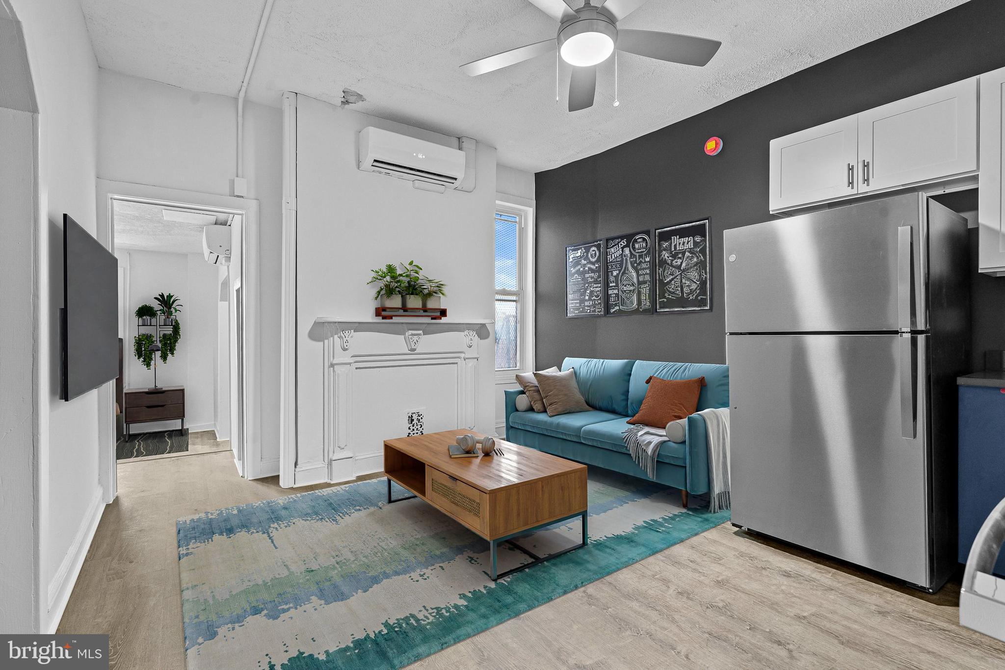Experience the perfect blend of historic charm and modern luxury in this stunningly renovated 1-bedroom, 1-bathroom apartment! Situated within a beautifully preserved historic building in the vibrant Franklin Square neighborhood, this unit offers a unique and sophisticated living experience.Step inside and be captivated by soaring 12-Foot Cathedral Ceilings, Creating an open and airy atmosphere throughout the apartment. Elegant Hardwood Floors,  Flowing seamlessly through the living spaces, adding warmth and character. Gourmet Kitchen: Featuring sleek gray stone counter-tops, stylish two-tone cabinetry, and classic subway tile backslash.  Charming Fireplace Mantel, A beautiful focal point in the living area, offering a touch of historic elegance. Breathtaking View of Franklin Square Park Enjoy picturesque views right from your living room window, providing a tranquil escape in the heart of the city. Modern Bathroom with Newly designed with contemporary fixtures and finishes. This prime location offers and unbeatable commute.  Just 10 minutes to the bustling Downtown Baltimore, the excitement of Camden Yards, the vibrant atmosphere of Hollins Market/Washington Village, and easy access to I-95. Historic Charm of Franklin Square to Immerse yourself in the rich history and beautiful architecture of this desirable neighborhood. Easy Access to Amenities to enjoy nearby restaurants, cafes, shops, and cultural attractions.
