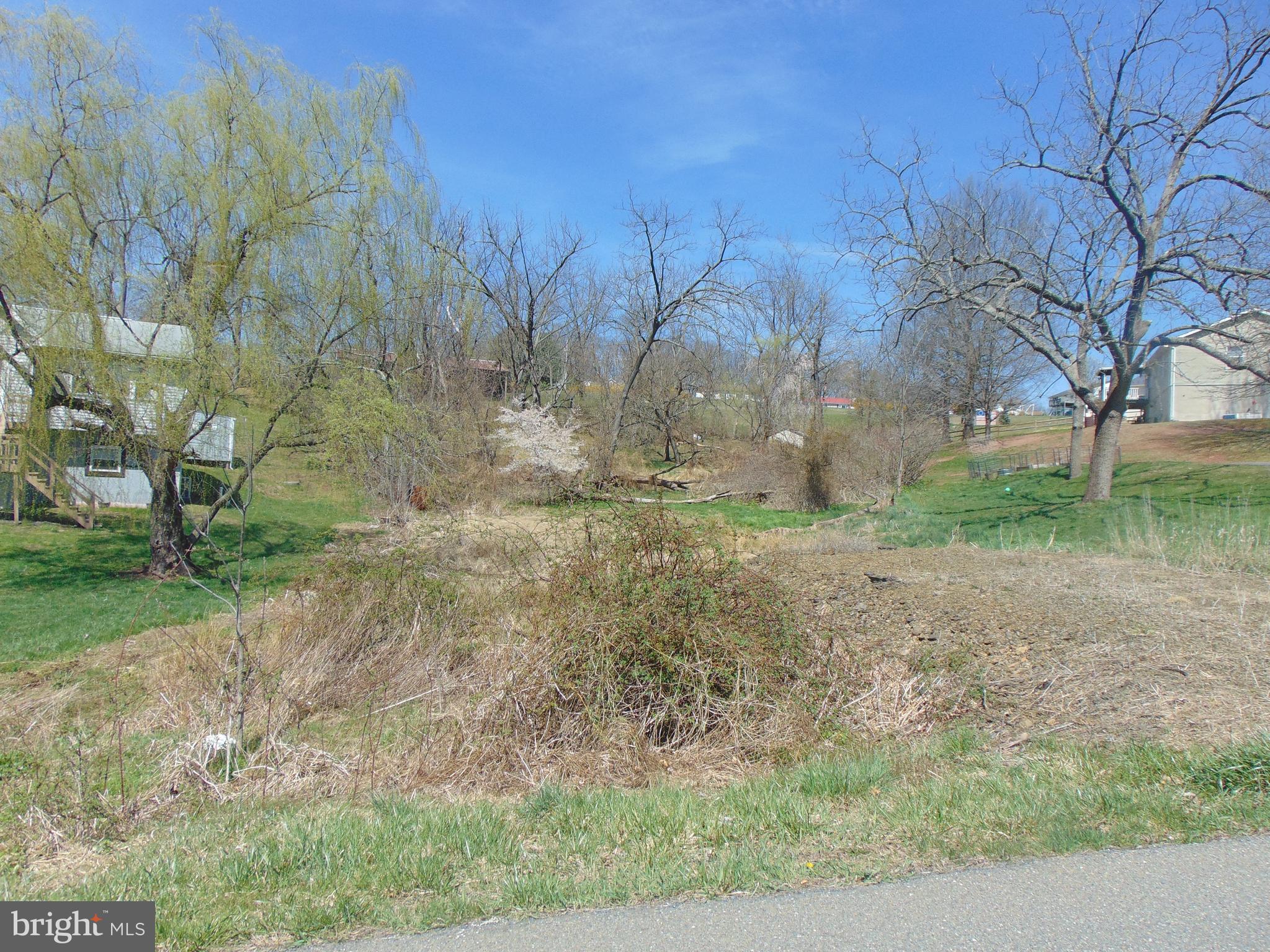 Build Your Dream Getaway at Lake Wynonah!
Don’t miss this beautiful ½‑acre building lot nestled in the gated Lake Wynonah community. Surrounded by nature and recreation, this lot offers the perfect balance of privacy, comfort, and convenience.  Owners have had this lot perc approved, & have also added the swale & the parking area, which is large enough to park their boat & jet ski.

Two stunning lakes for boating, fishing, and relaxing. Clubhouse and swimming pool.
Secure, gated community with a peaceful setting

Close to the Appalachian Trail — ideal for hiking and outdoor adventures
Only 10–20 miles to nearby golf courses, wineries, and breweries
A perfect spot for a full‑time residence or weekend retreat

Whether you’re looking to build now or invest for the future, this lot offers an unbeatable lifestyle in one of Schuylkill County’s most sought‑after communities.
Come experience Lake Wynonah living — where nature meets comfort.
