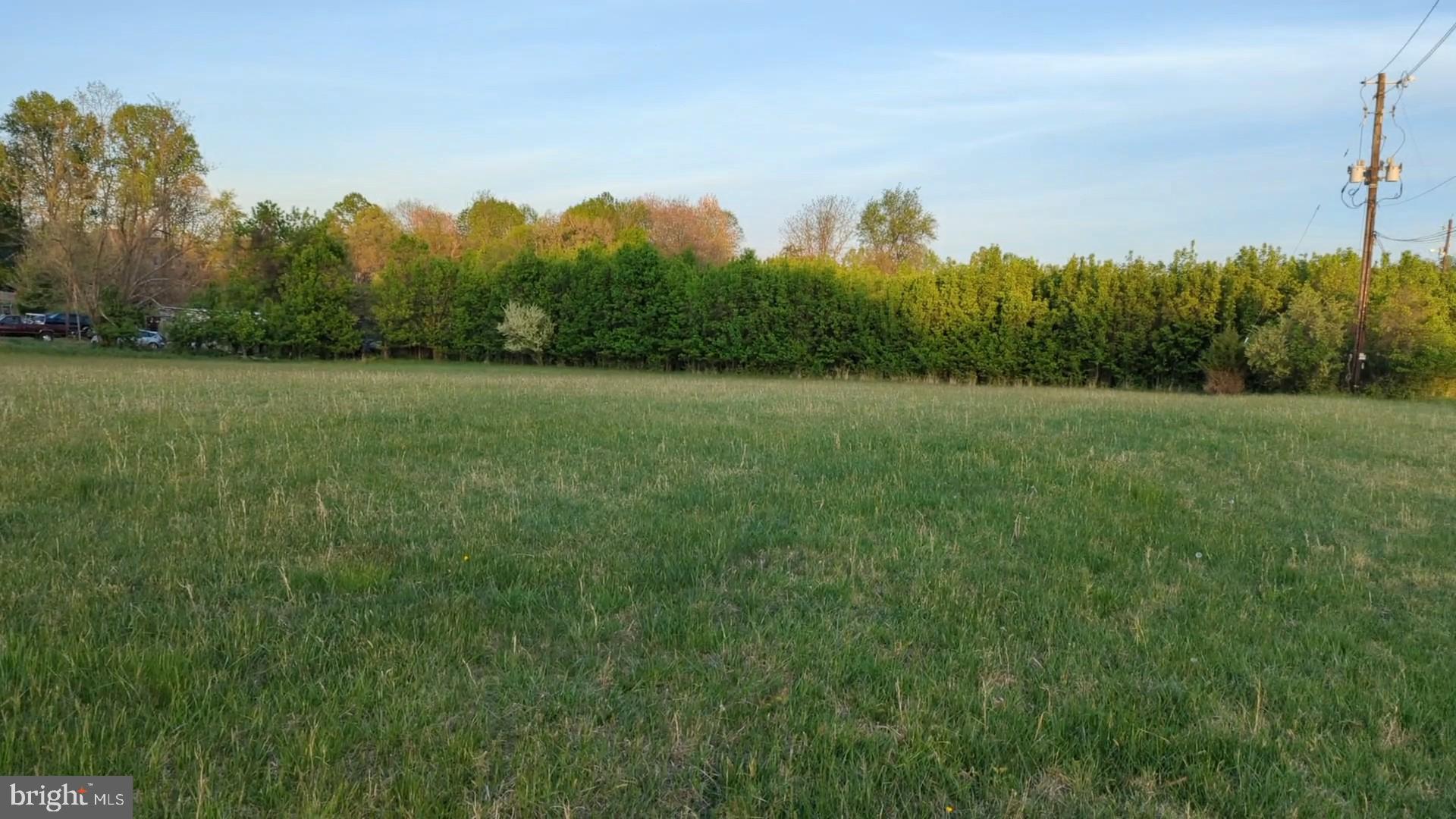 A rare and compelling opportunity in the heart of Olney, this premium 2.44 acre parcel offers a fantastic combination of location, scale and flexibility. Perfectly situated off Old Baltimore Road  between Ampeg Lane and Winter Morning Drive, the property sits just two homes away from the sought after Toll Brothers built Olney Estates community, where neighboring residences exceed 8,000 square feet and values surpass $1.8 million supporting strong long term upside while remaining accessible for a range of custom home visions.
The lot’s gently level topography provides excellent buildability, making it well suited for anything from a thoughtfully designed custom home to a larger estate or future investment. Surrounded by established homes, green space and community landmarks, the setting offers both immediate appeal and enduring value.
Families will appreciate access to highly regarded Montgomery County public schools, recognized for both academic strength and competitive athletic programs. Nearby private options further enhance the area’s appeal, including Our Lady of Good Counsel High School, known for its strong college preparatory curriculum and standout athletics. This blend of scholastic and athletic opportunity adds meaningful lifestyle value for a wide range of buyers.
Positioned adjacent to Faith Presbyterian Church, the property also presents potential for institutional or faith based use. With ample space to accommodate a sizable congregation and parking (subject to planning and approvals), the lot offers versatility to suit a variety of needs and visions.
Whether you’re building your dream home, developing or investing, this property delivers a unique chance to secure land in one of Olney’s most desirable and established locations. A review of aerial and satellite imagery highlights its strategic placement among higher value homes and key community features.
Opportunities like this are increasingly limited, don’t miss your chance to bring your vision to life in this sought after setting.