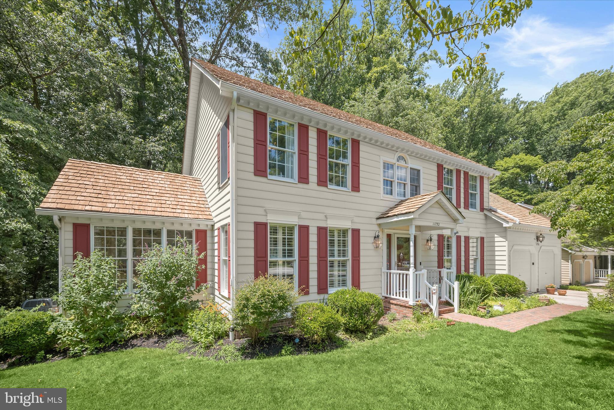 Open house this weekend Saturday & Sunday, one to three pm. Built by semi-custom homebuilder Nu-Homes, this rare offering stands perfectly on a large, private, premium cul de sac lot in Clarys Forest. Your spacious & gracious park side retreat directly overlooks the Middle Patuxent River Environmental Area.  Note the level concrete, double driveway upon your arrival. The home has been expertly updated & maintained by caring, long-term owners. Inside you'll find sleek, natural solid oak flooring, a kitchen designed for the home cook with stainless appliances, service bar, loads of storage & a new 36" natural gas cooktop sure to inspire your inner gourmet.  Breakfast & family rooms flow seamlessly from the kitchen. This home was fully optioned with on-trend crown & chair rail moldings, a generous main-level library plus the conservatory off the living & dining room; either space could serve as an additional bedroom if needed.  The formal living & dining rooms easily accommodate larger furnishings. Check out the view from the amazing event-sized screened porch, deck & blue stone circular patio. The finished lower level includes a private, legal 5th bedroom with a wide closet, full bath, the 2nd family room with a wet bar, an ample dedicated storage or wine room, plus a ventilated flex space perfect for exercise, meditation or a workshop -- you decide. Most of this level offers full daylight living which walks out through updated, "half-light" double doors to the custom patio overlooking the fully fenced natural setting.  It's a pets paradise. From the dramatic open upper foyer, you'll discover a lovely loft serving as a sitting room, play area, study or additional office space.  Someone is going to love the magical, private secondary suite with skylights, vaulted ceiling & large closet. The primary suite is well-appointed with vaulted ceilings, walk-in closet, double vanity, walk-in shower & spa soaking tub. All closets are generous. Welcome to space & serenity. Sellers prefer a quick closing. Thank you for your interest!