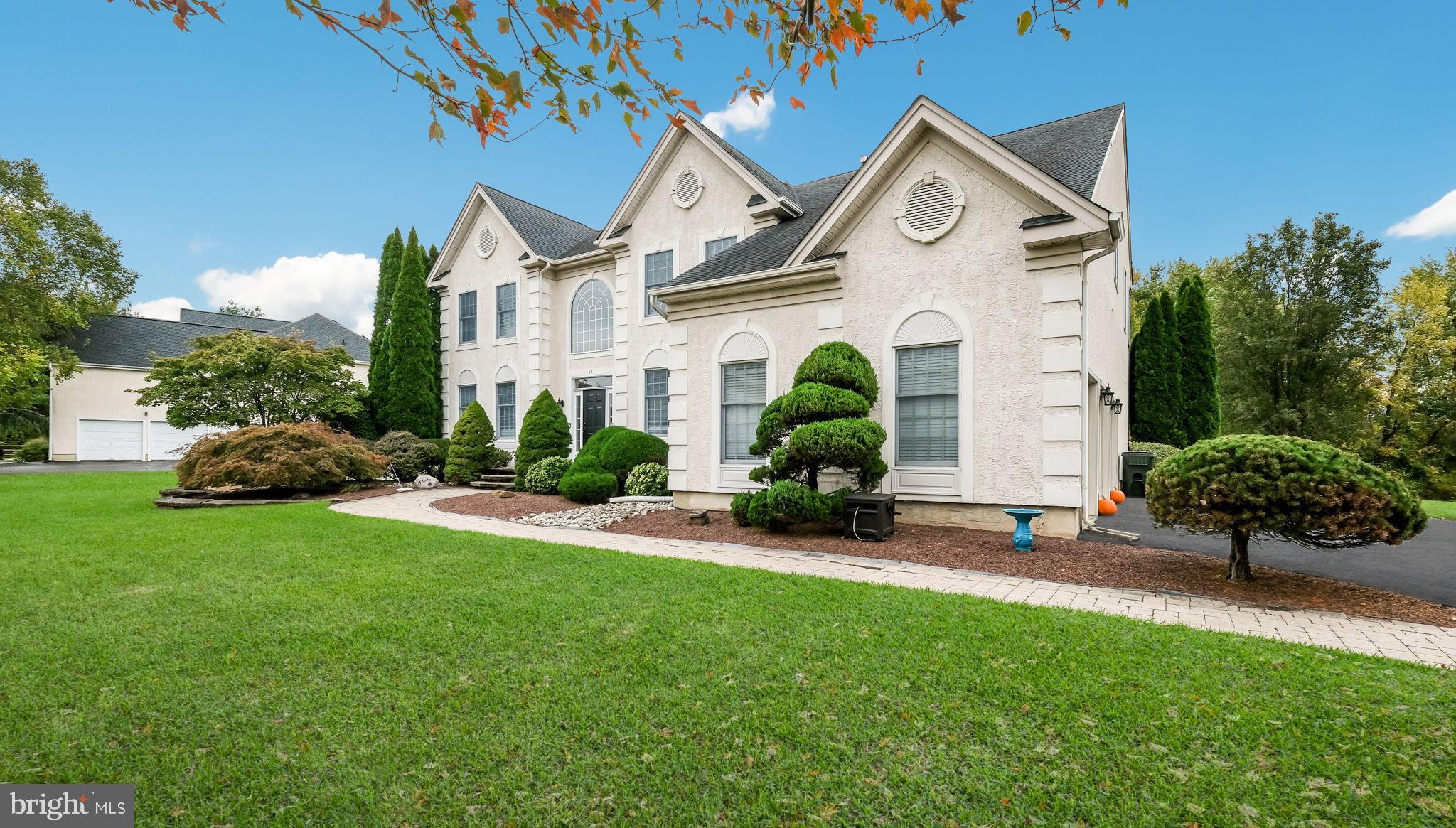 This is the one you've been waiting for!  Nestled in the prestigious Eagle Glenn community, this Colonial-style residence offers a spacious and very functional layout. Built in 2000, this home has been meticulously maintained.  Enter into the 2-story foyer that opens into the spacious, open floor plan that seamlessly connects the living areas, perfect for both entertaining and everyday living. The heart of the home is the large, gourmet kitchen, featuring stainless steel appliances, including a double oven, cooking alcove, and an island with built-in microwave and beverage refrigerator.  The kitchen offers plenty of storage options with both a walk in pantry plus a pantry cabinet, and a built-in desk that will help keep your family organized. The kitchen flows effortlessly into the breakfast area with sliding doors to your deck overlooking the pool, and proceeds to open into the 2-story family room, where a cozy fireplace creates a warm ambiance for gatherings. The main level also boasts a generously sized formal dining room with picture molding, living room with 2-piece crown molding, and separate office.  Nine foot ceilings throughout the first floor help create a feeling of grandeur and spaciousness.  Head upstairs via one of the 2 staircases to find an oversized primary suite with tray ceiling, walk in closets and a beautifully remodeled bathroom with marble countertops and soaking tub.  The large laundry room is conveniently located off of the primary suite.  Three additional bedrooms, all with good closet space, plus a full bath that has also been beautifully remodeled, complete the second floor.  The fully finished basement offers a built in bar with sink, a half-bath, and additional living space, perfect for a media room, home gym, or play area.  Outside, the property is equally impressive. Step onto the trex deck complete with retractable awning which is a perfect place to relax after enjoying your personal in-ground salt water pool. This home features many recent upgrades, including a newer roof, newer hvac, newer and upgraded electrical panel, a reverse osmosis water filtration system and more!  All of this in the prestigious Council Rock school system and in close proximity to the center of Newtown, Rt 295 and public transportation.