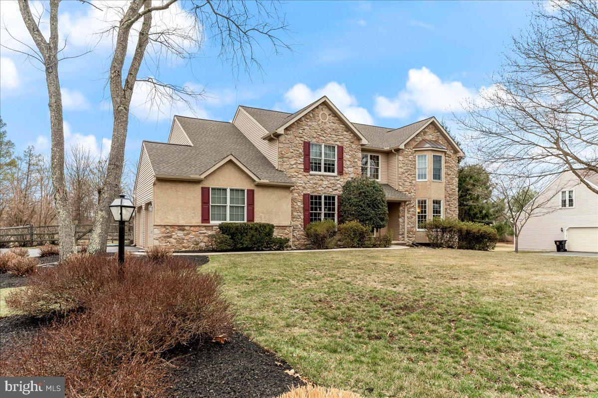 Stunning and spacious  4 bedroom  Chester Springs Colonial in sought after community of  Wetherill Estates.
Meticulously maintained, this Chester Springs classic w/3,430 fin sqft is loaded with updates, situated on a premium, .80 acre,  level  lot with in-ground pool, backs up to open space and looks out the front to private 9.5  acre community park. Updates include but not limited to: New roof, gutters and downspouts(2024), HVAC(2023), Water Heater(2022) and custom, in-ground pool liner(2018), pool filter(2023) and cover(2018). All kitchen appliances and washer/dryer included.
Dramatic 2-story foyer with hardwood flooring and on-site finished crown molding, wainscoting and chair rail throughout the the main floor.
Large dining room(16x12) to your left with hardwood flooring, molding package and large enough to accommodate the largest of dining room tables and hutch cabinets. The formal living room(15x14)to your right has hardwoods, recessed lighting plus upgraded moldings. 
The gourmet, eat-in kitchen(24x15) boasts 42" custom cabinetry, granite countertops, tile flooring, kitchen island, and tile backsplash and overlooks cozy family room(15x19) with gas fireplace and recessed lighting along with Butler pantry w/ glass cabinets.  Main floor home office/den complete with upgraded moldings, custom built-ins will and scenic views of rear yard.
The 2nd floor begins with a large owner's suite(15x17)featuring wall to wall carpets, walk-in closest, and sitting/dressing room(15x13). These rooms adjoin the luxurious owner's bathroom with jetted tub, skylights and  walk-in shower.  The 2nd bedroom  features w/wall to wall carpeting and walk-in closet. The generously sized 3rd and 4th bedrooms have wall to wall carpets and neutral themes.
Perfect for entertaining, the spacious two-tiered  rear deck(28x14) overlooks in-ground pool and private rear yard.  
Level front, rear and side yards along with lush landscaping finish this masterpiece in a pristine park-like setting.
Low taxes, Low HOA,  award winning Owen J Roberts schools and surrounded by 75 acres of deed dedicated open space.
Move-in ready,  centrally located, close to shopping, parks, and restaurants/entertainment with easy access to routes 100, 401, 23, 422 and PA Turnpike, this country oasis is ready for your next chapter.
Showing begin at open house on Sunday, March 23rd, 12-2pm.