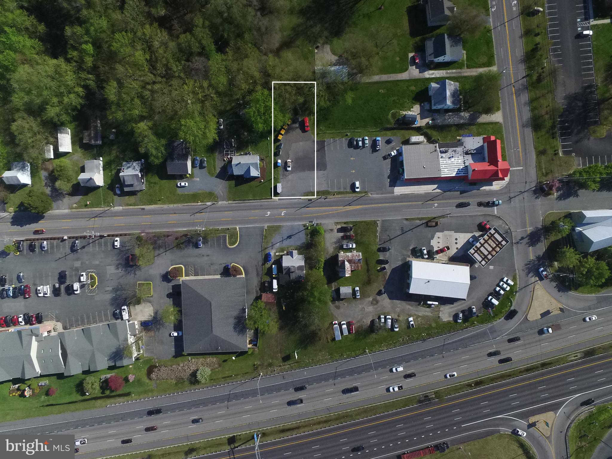 GOLDEN OPPORTUNITY TO BUILD YOUR OWN BUSINESS!  THIS ZONING WILL ALLOW JUST ABOUT ANYTHING (CHECK W/QA CO.) INCLUDING AUTO REPAIR, RESTAURANT, SELF STORAGE, FAST FOOD W/DRIVE THRU, DAYCARE, ASSISTED LIVING, HAIR SALON, RETAIL, SHOPPING, ETC.  INCOME PRODUCING PROPERTIES OF 4 HOMES & ONE PARKING LOT.  MUST BE SOLD WITH 1508,1510,1512 POSTAL RD AND 2742 COX NECK ROAD.