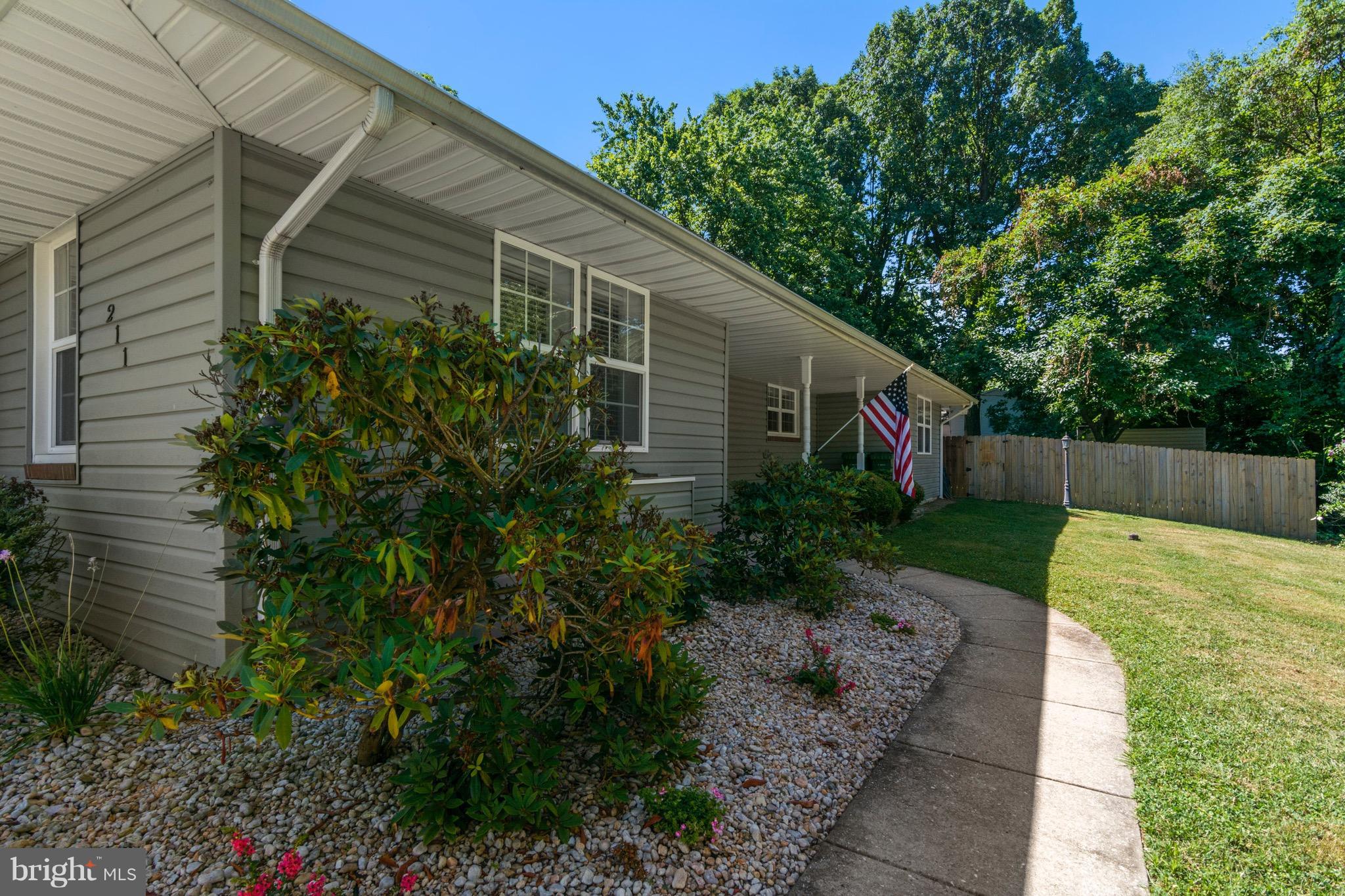 Great updated home with a large fenced corner lot.  Lots of updates include siding, roof, kitchen, bathroom, master bedroom addition.....no HOA, corner lot with plenty of parking, New carpet and fresh paint.  Ready to move-in- no work. Rancher style home with 3 bedrooms and a huge family room w/ brick front wood burning fireplace!  Fenced backyard with large shed. Schedule showings online.