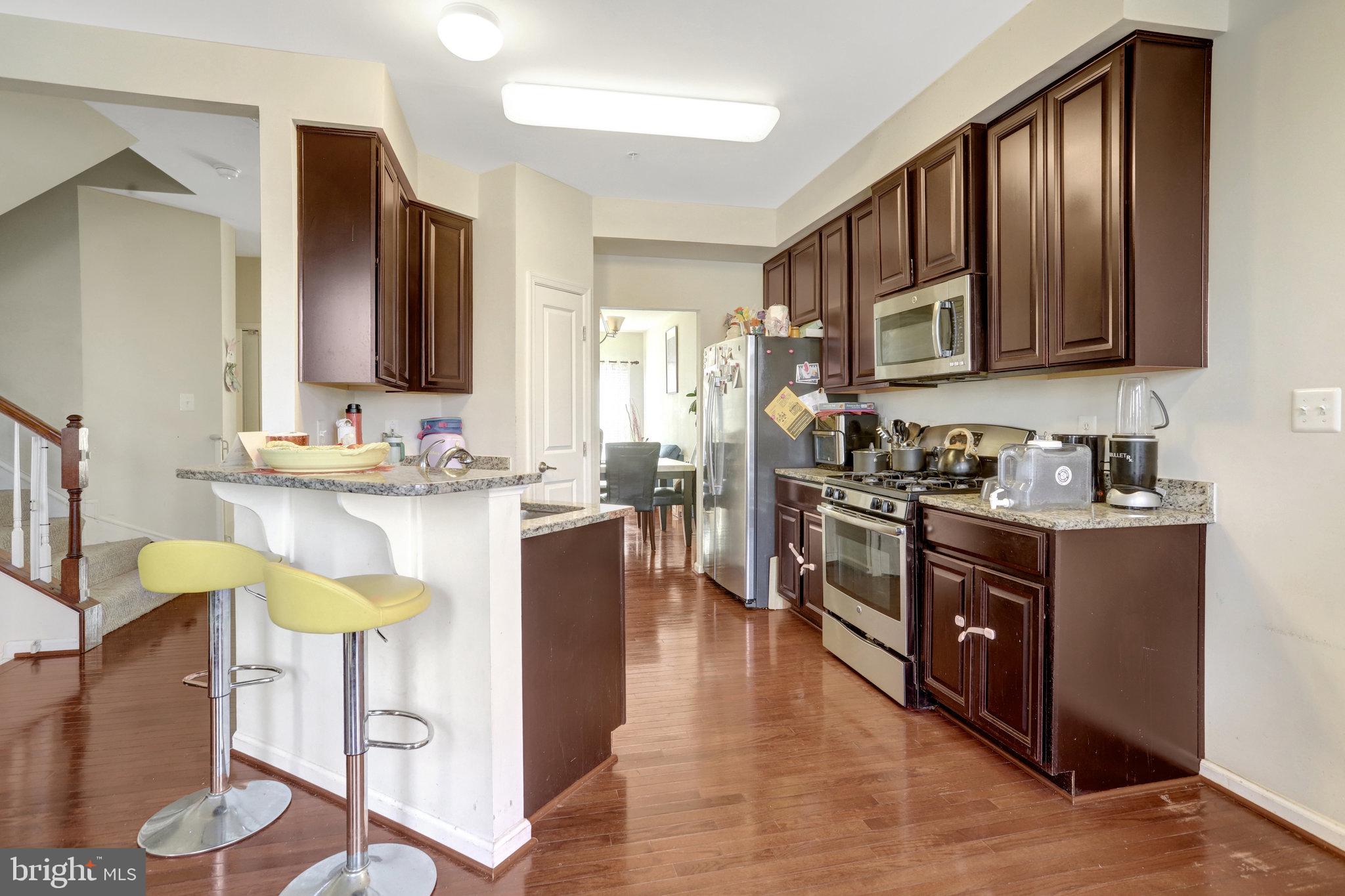 Welcome home to this beautifully maintained 3-bedroom, 3.5-bath townhome offering comfort, space, and a host of community amenities. Step inside to find gleaming hardwood floors and an updated kitchen featuring modern finishes and direct access to your private deck—perfect for relaxing or entertaining. The home also includes a versatile bonus room, ideal for a home office, guest space, or recreation room. Each bedroom is generously sized, and the property provides the convenience of three full bathrooms plus a main-level half bath. Located in a vibrant community featuring a swimming pool, clubhouse, tennis courts, basketball court, walking trails, and more, this property offers both comfort and lifestyle. A wonderful opportunity in Accokeek—move-in ready and waiting for its next owner! sold as is