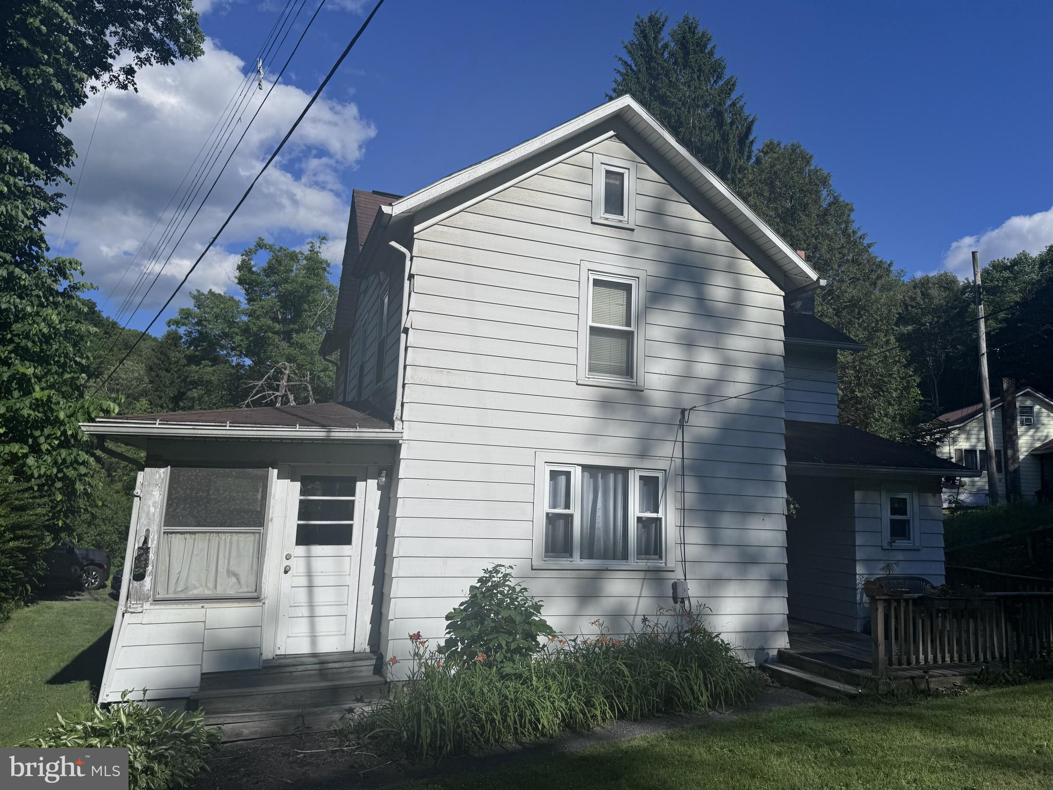 Dreaming of owning a home without breaking the bank? This could be the opportunity you've been waiting for! Nestled on a peaceful one-acre wooded parcel, this affordable two-story offers the chance to stop paying your landlord's mortgage and start investing in your own future.  Sure, it needs a little love, but that's where the opportunity is. Move right in, make updates at your own pace, and watch your hard work turn into equity. The first floor features a spacious oak kitchen with plenty of cabinetry, a generously sized dining room ready for everything from weeknight dinners to holiday gatherings, and a large living room with plenty of space to kick back, entertain, or simply make yourself at home.  Upstairs, you'll find three comfortable bedrooms and a full bath, giving everyone a place to call their own.  Step outside and enjoy the peaceful country setting surrounded by trees, yet just minutes from town. Whether you envision backyard bonfires, a garden, space for the kids or dogs to roam, or simply enjoying the quiet after a busy day, this acre gives you room to breathe. The large shed is perfect for storing your mower, tools, outdoor toys, or creating the workshop you've always wanted.  Finding a home with this much potential, this much land, and this much value isn't easy. Bring your ideas, your paintbrush, and your vision! It won't take much to make this one shine. Don't miss your chance to turn this house into a home and start building equity instead of rent receipts. Your next chapter starts here!