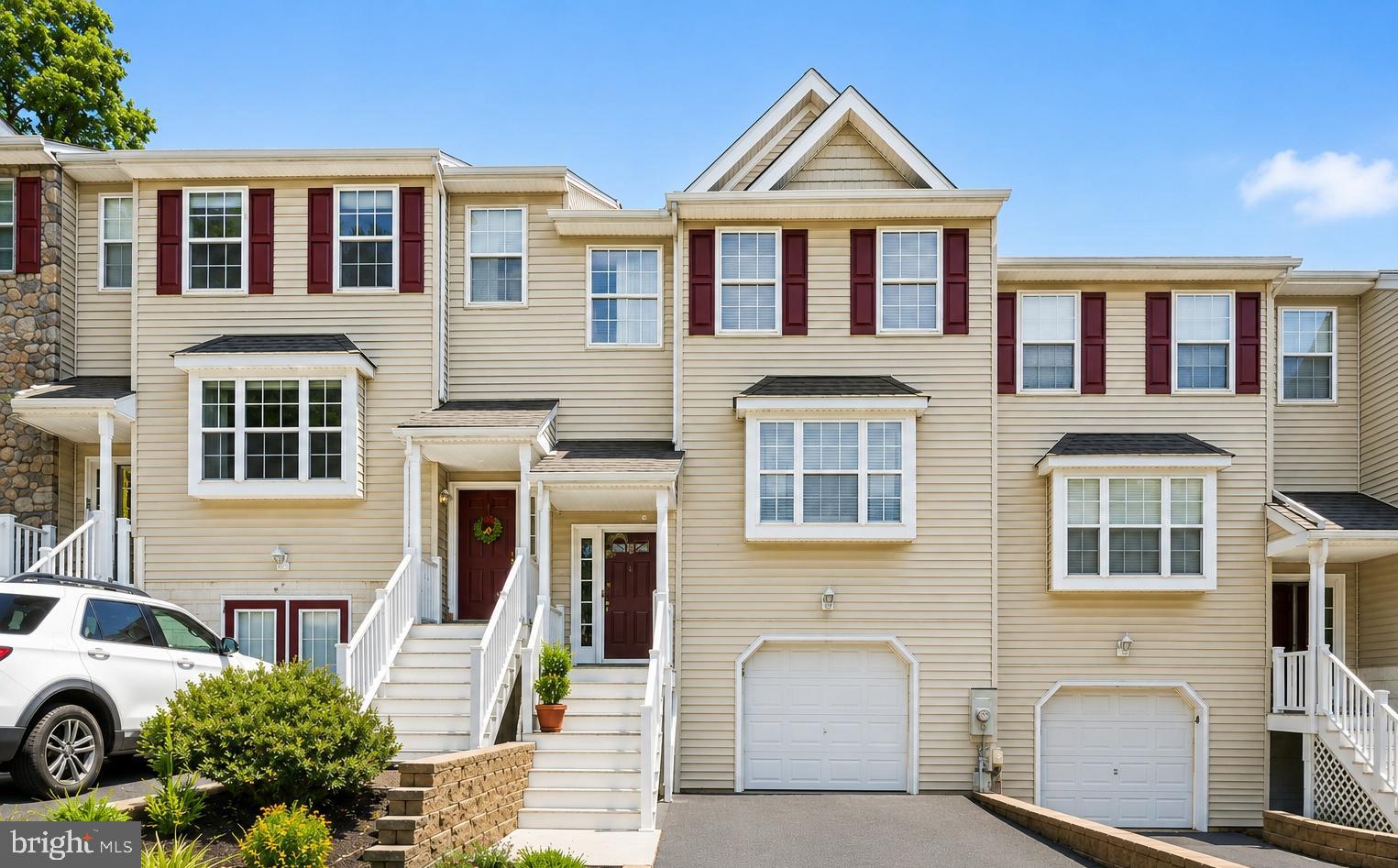 Welcome to 16 Linda Lane, a newly painted,MOVER-IN READY, spacious and beautifully refreshed townhouse offering 2,096 square feet of comfortable living space. This charming 3-bedroom, 2.5 bathroom home combines modern amenities with timeless details to create a welcoming and functional space.

Step into the heart of the home, a fully renovated eat-in kitchen that is truly makes meal prep feel special. Featuring premium quartz counters, stainless steel appliances and an electric oven, this kitchen is a favorite. Step off the kitchen into the new deck with maintenance free decking. Adjacent to the kitchen, is the large dining room and the living area with large bay window providing lots of natural light. This room is also highlighted by a gas fireplace.
The home is completely MOVE-IN READY with rich hardwood floors throughout the first and second floors. Three generous bedrooms and 2 baths complete the second floor.
The home’s outdoor spaces are just as inviting! There is a lower level patio overlooking the private yard. This walk-out level is completely finished with brand new carpeting and provides endless possibilities for a study, recreation room or even a home gym. Freshly sealed driveway and private cul-de-sac location enhance the curb appeal.

Situated in Aston Mills, this property is perfect for anyone looking for a move-in ready home with stylish finishes. 16 Linda Lane has everything you’re looking for. Conveniently located near major highways, shopping, restaurants as well as the local Septa station. Don’t miss your chance to see this exceptional property. Schedule your private tour today!
