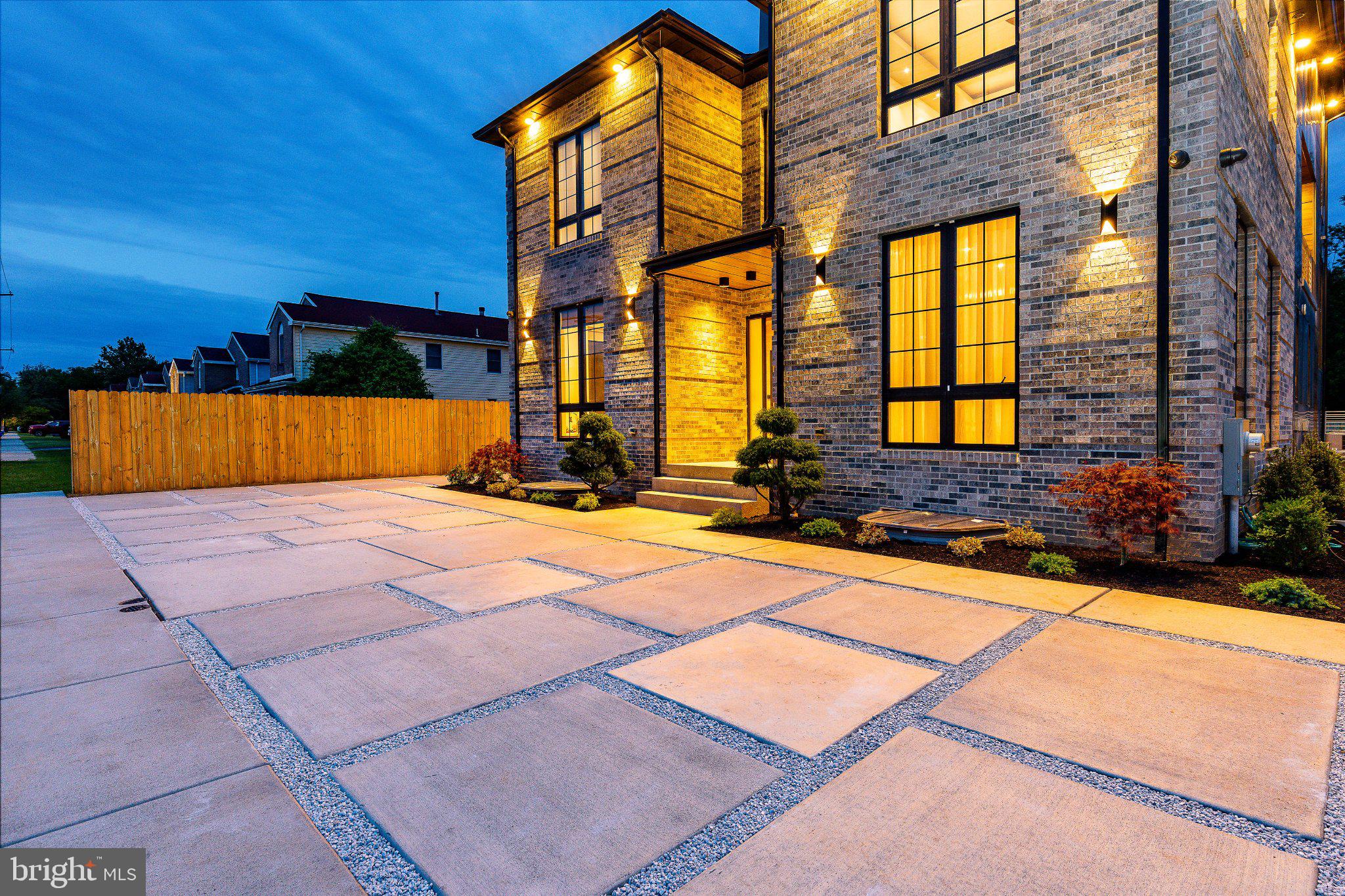 Welcome to 9739 Krewstown Road; where modern luxury meets intentional design. This is not just a home it’s the result of a vision thoughtfully brought to life over two years, crafted with purpose, precision, and a clear standard: no compromises. From the moment you step inside, the experience is immediate. Sunlight moves effortlessly through the home, illuminating rich Brazilian hardwood floors and a clean, contemporary aesthetic inspired by California living. Every finish, every material, every line was carefully selected to create a space that feels both elevated and deeply livable. At the center of it all is the kitchen—an undeniable showpiece. Outfitted with top-of-the-line stainless steel appliances, custom cabinetry, and a striking Taj Mahal quartz island, it’s the space that naturally draws people in. Guests don’t just notice it—they gather around it. It anchors the main level and effortlessly connects to multiple dining areas, from a formal dining room to a casual breakfast bar designed for everyday living.
The home was built for connection. Gatherings flow seamlessly from indoors to out, with the kitchen opening to a spacious deck that transforms into an open-air living room—perfect for entertaining, relaxing, and extending every moment just a little longer.
Upstairs, the primary suite offers a true retreat—calm, expansive, and refined. The spa-like en-suite features an oversized walk-in shower, dual vanities, and elegant marble finishes, creating a space designed for both function and escape. Four additional bedrooms continue the home’s elevated feel, each with its own en-suite bath, walk-in closet, and private balcony offering comfort and privacy at every turn. A dedicated laundry room adds convenience, while the fully finished basement redefines what additional living space can be. With 10-foot ceilings, two bedrooms, a full kitchen, full bath, and a complete entertainment setup, it becomes a world of its own ideal for guests, multi-generational living, or a private retreat. For the current owners, it became a true sanctuary the kind of space where time disappears. One of the home’s most striking architectural moments is the staircase a true centerpiece featuring Brazilian hardwood floating treads, exposed interior brick, and floor-to-ceiling windows that flood the space with natural light. It’s not just a transition between levels it’s a statement. Beyond what you can see, what truly sets this home apart is what you feel. The way light shifts throughout the day. The level of craftsmanship in even the smallest details. The intentionality behind every decision. It’s a home that reveals itself over time and once you notice it, you can’t unsee it. Step outside to a fully fenced, expansive backyard designed for both privacy and play, along with a spacious deck built for al fresco dining and effortless entertaining. The exterior blends stone and contemporary siding, complemented by professional landscaping and ample driveway parking. Perfect Saturdays here begin slowly; coffee in the kitchen as sunlight pours in; then evolve into afternoons on the deck, evenings with friends, and nights that carry on downstairs where no one is in a rush to leave. It’s a home designed around real life entertaining, relaxing, and recharging. Located in the desirable Krewstown area of Bustleton; a setting that puts dining, fitness, parks, and everyday conveniences within easy reach, the lifestyle here extends well beyond the walls of the home. With 9 years remaining on the tax abatement, this property also offers meaningful long-term savings adding financial value to its already exceptional design and livability. This home is for someone who wants it all a space warm enough to grow into, yet refined enough to feel like a private retreat. A home for those who appreciate design, value experience, and refuse to compromise. This is more than a home. It’s a lifestyle by design.

Schedule your showing today.