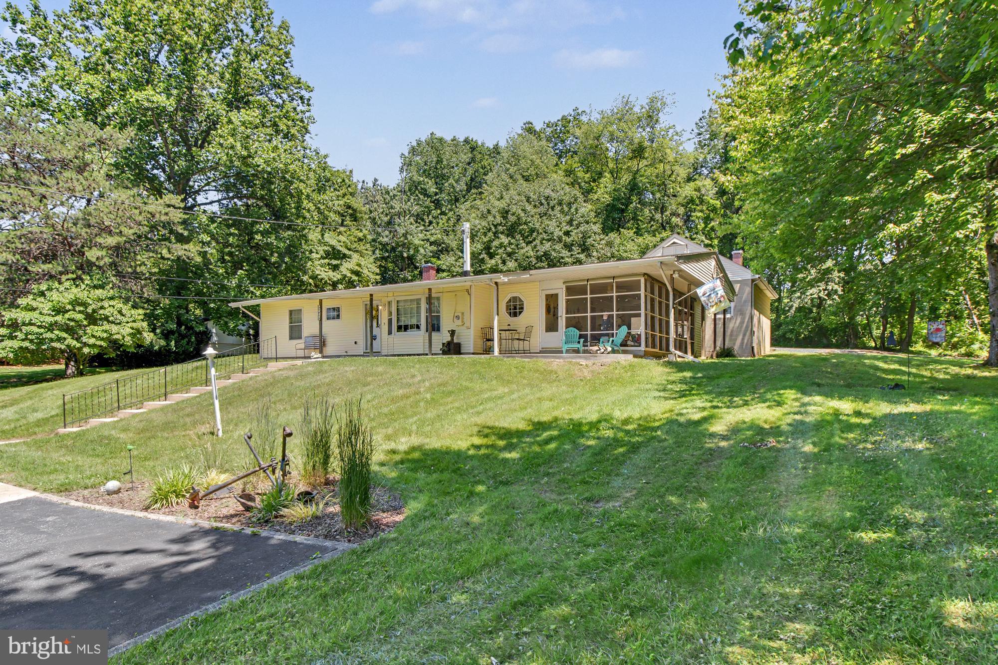 Rare waterfront opportunity featuring multiple parcels with incredible potential! Parcel 185 includes a charming 2-bedroom, 1-bath ranch-style home with beautiful water views and a covered front porch perfect for relaxing. The home has been updated within the last 5 years, including a new roof, hot water heater, LVP flooring, kitchen counters, kitchen backsplash, and bathroom backsplash. Additional features include Anderson windows and a water softener system for added comfort and efficiency.
The property also offers outstanding garage and workshop space with a detached 24' x 28' heated 2-car garage complete with electric, water, and heat, plus an additional bonus 1-car garage. An additional included parcel, 356, consists of approximately 10,000 sq ft of wooded, non-buildable land that is part of the Harford County Land Trust, providing added privacy, protected natural surroundings, and a scenic buffer from neighboring properties.
Also included in the sale is buildable waterfront Parcel 358 totaling approximately .21 acres featuring a 175' private pier with direct water access, two boat slips, a boat lift, electric, and water. The pier has been upgraded with a new electrical box, new wiring, and 30-amp service, making it ready for your boating adventures. The waterside parking pad is large enough to accommodate a fifth-wheel RV, adding even more flexibility to this exceptional property.
A unique opportunity to own a versatile waterfront property package offering water views, boating amenities, buildable waterfront land, ample garage space, protected natural surroundings, and endless possibilities for recreation, expansion, or year-round living!