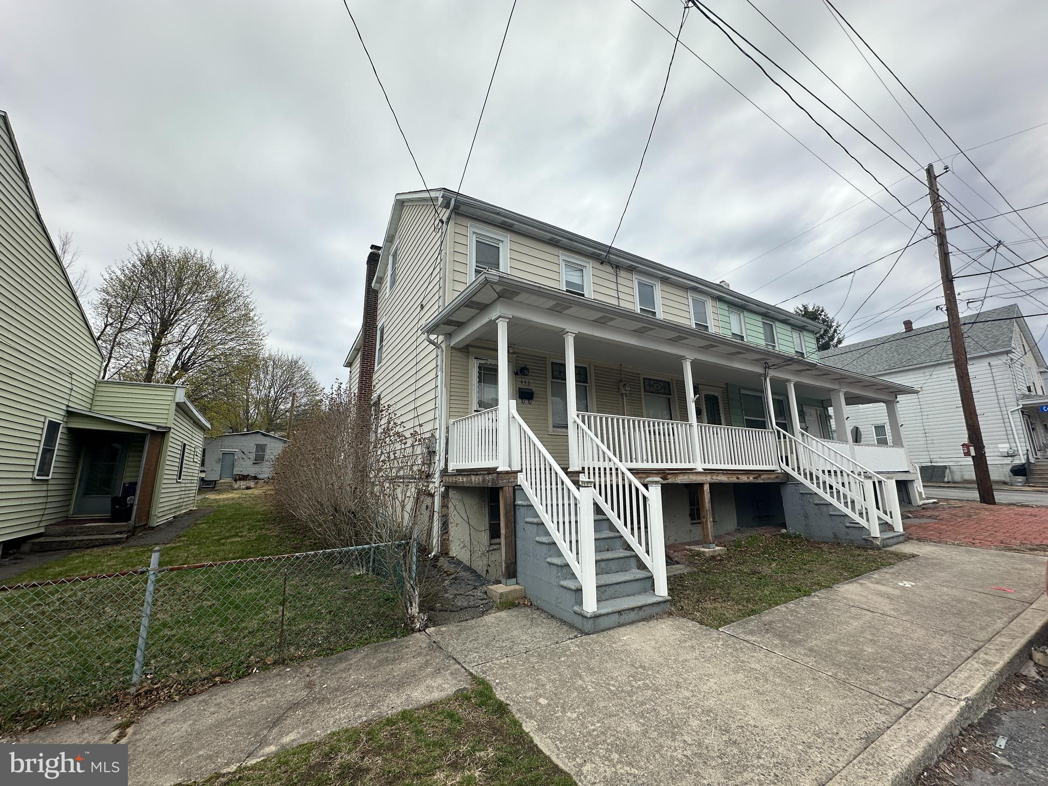 Highest and Best by April 18 at 5:00 pm. Located in Tamaqua's Dutch Hill section , these two homes  are being sold together as a package.  443 is a three bedroom ,one bath,end of row with a detached garage.  445 is a 2 bedroom, 1 bath ,interior row with a detached garage.  Theses properties offer a wondeful opportunity for a buyer that wants to own multiple properties.  Both addresses are being sold together because there is only one oil heat plant that services both homes. Do not miss this opportunity!!