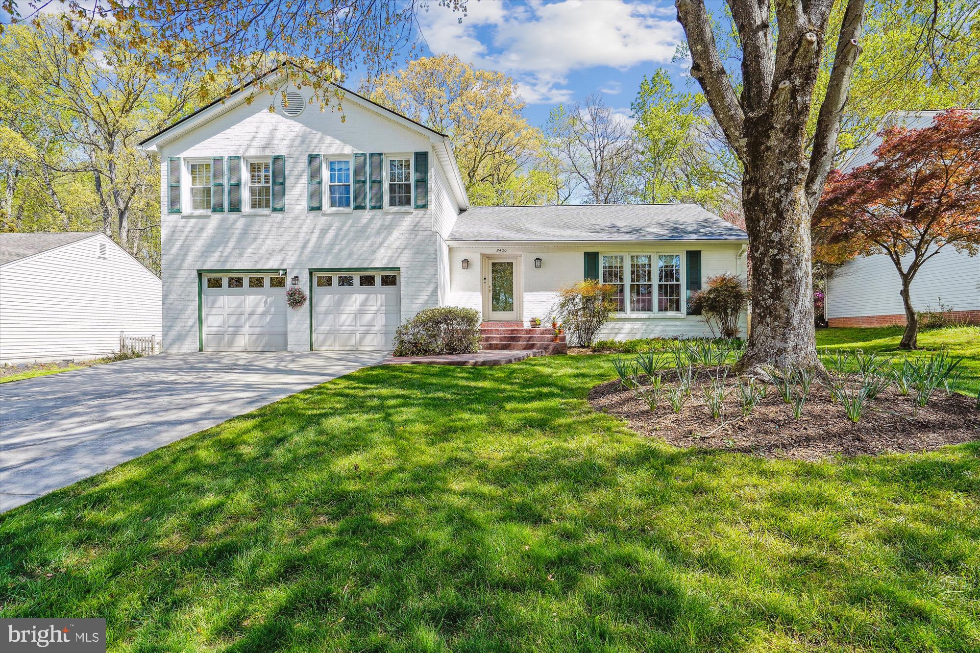 Welcome Home to this beautiful colonial split-level located in Vienna Manor neighborhood of Vienna! Owners have lovingly maintained and upgraded this surprisingly spacious home over the years. Extension was done in 2006 to the kitchen ,perfect place for entertainment.The kitchen has been updated with refinished cabinetry, granite countertops, and a high end stainless steel appliances.This  home has so many wonderful updates that provide comfort, convenience, and visual charm. It features four bedrooms with pleasant views and renovated kitchen  and bathrooms.  Step inside the foyer with experience the warmth of hardwood floors in the living room and the dining room.The upper level boasts 4 bedrooms and an updated  full bathroom with heated floor, walking closet . The lower level includes large family room with a ceiling-to-floor brick fireplace for cozy evenings to watch movies,Heated tiles, including French-style double doors lead to a beautiful  patio , perfect for barbecues, enjoying a cup of coffee or reading a book. The laundry room features a custom-designed, built-in closet for optimal organization. There is an additional AC unit was add it to the top level to enjoy the coolness in summer.The furnace are in excellent condition and professionally maintained twice a year.The roof was install 2024.The garage accommodates two SUVs and provides additional storage space. The large flat,  backyard is perfect for outdoor games or gardening. Enjoy year-round color and fragrance from daffodils, dahlias, peonies, roses, and azaleas, all meticulously maintained within the professionally landscaped lawn.  This home offers a peaceful retreat set back from the street while just minutes away from everything you need.  It is very convenient 1mile from Dunn Loring Metro and Tyson's Corner, the Metro's Silver Line, the Beltway. And minutes away from (W&OD) trail and all of Vienna's wonderful shops and restaurants.