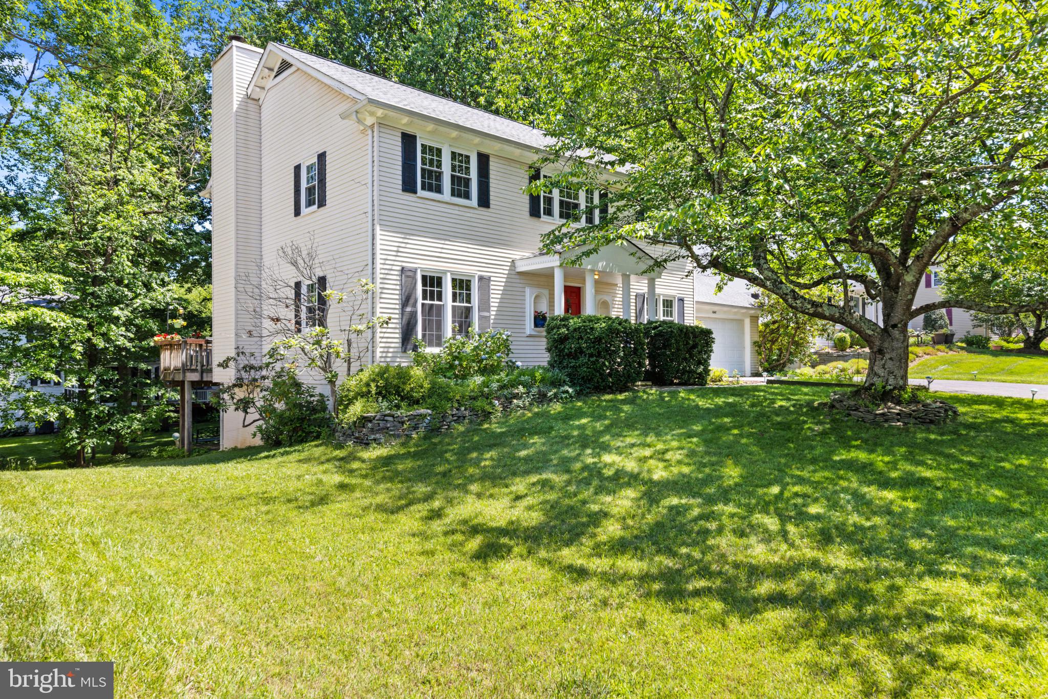 Come see this wonderful home in Burke Centre! Beautifully remodeled kitchen was redesigned to maximize functionality, nearly doubling storage, lighting, and outlet capacity while improving the overall layout. Elegant quartz countertops run throughout, complemented by clever custom touches including extra-deep drawers and cabinets, a built-in wine rack, and enhanced lighting that showcases the expansive floor-to-ceiling pantry. Throughout the main level, 9-inch wide-plank European white oak flooring adds warmth, character, and charm to every room. Even a BRAND NEW HVAC system as of 6/3/26!

The primary bathroom has been completely reimagined into a luxurious retreat, highlighted by an oversized  22 sq. ft. glass-enclosed shower featuring dual shower heads and body sprayers. Beautiful vessel sinks sit above the vanity, while thermostat-controlled heated flooring adds year-round comfort.

The main bathroom includes a newly installed tub and shower with a rainfall showerhead and magnetically mounted handheld sprayer. A generously sized closet offers flexibility for a mini washer/dryer combo, supplementing or potentially replacing the basement laundry setup.

Downstairs, the expansive basement recreation room creates a truly unforgettable entertaining experience. Anchored by a dramatic 14-foot floor-to-ceiling mural inspired by a classic 1950s soda shop, this one-of-a-kind space evokes nostalgic charm reminiscent of Happy Days. Checkerboard carpeting, authentic tin ceiling tiles, vintage 1950s movie theater seating, and a popcorn dispenser complete the atmosphere. Included with the home are an original 1950s counter from Atlantic City, a 1970s jukebox with 2,000+ 45 records, a full-size pool table, four authentic red Naugahyde barstools, and six vintage red-and-black wire ice cream parlor chairs. Perfect for entertaining, celebrations, or creating lasting family memories. This level also features an additional full bathroom and a partially finished 10x11 bonus room ready for your vision.

Outdoor living is equally impressive, with a multi-level deck spanning the entire width of the home and garage, plus a lower deck accessible from the walkout basement. Multiple levels provide three access points from the house and three from the backyard, creating exceptional flow for gatherings and everyday enjoyment. The newest section, adjacent to the hot tub, was added in 2020, while the central portions were reconstructed this spring with upgraded 6-inch decking, replacing the original 4-inch planks.

Additional thoughtful updates include custom wood blinds in all three front-facing bedrooms, a stylish accent wall in the den, heated flooring in the primary bath, an updated basement shower stall, multiple dimmer switches in the kitchen and primary bath, projector wiring for an approximately 7-foot diagonal image with a 7-speaker surround sound system, and relocated/replaced shutoff valves for the front and rear hose bibs for easier access.